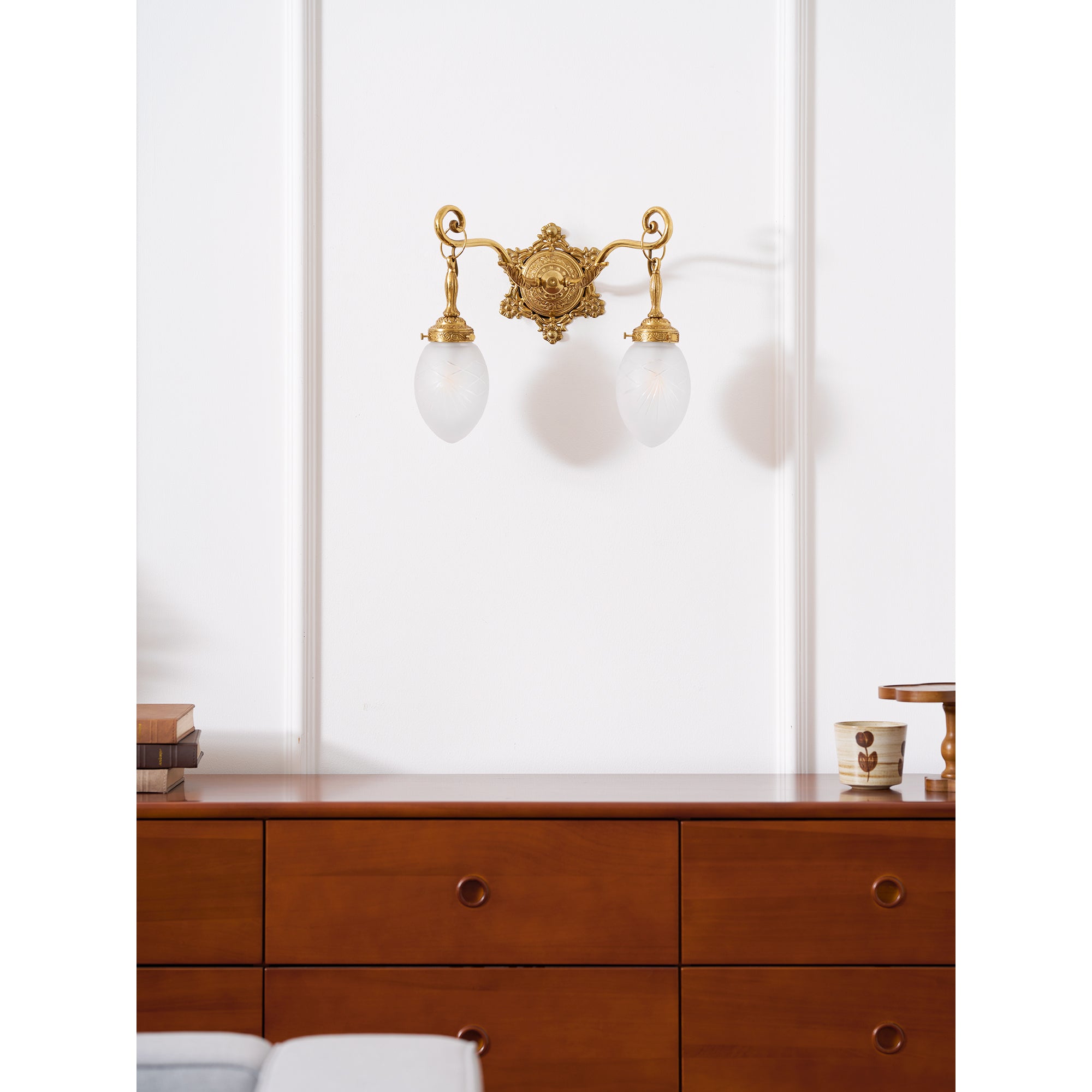 Solange Classic Wall Lamp with one head, showing brass body and glass shade.