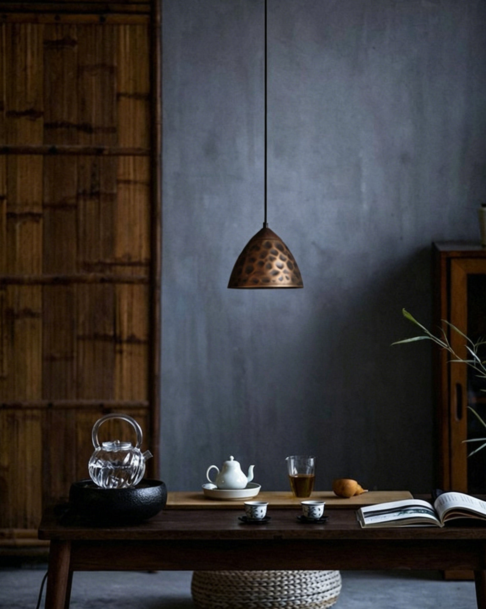 A cluster of Boyd Pendant Lamps illuminating a dining room table.