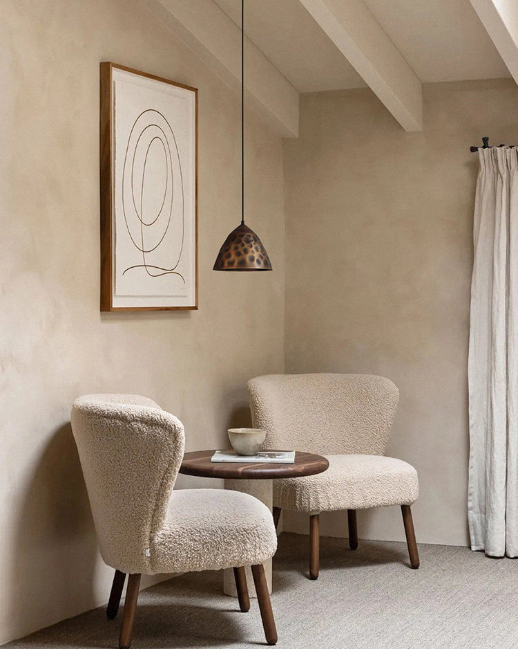 Angled view of the Boyd Pendant Lamp Model C in antique bronze.