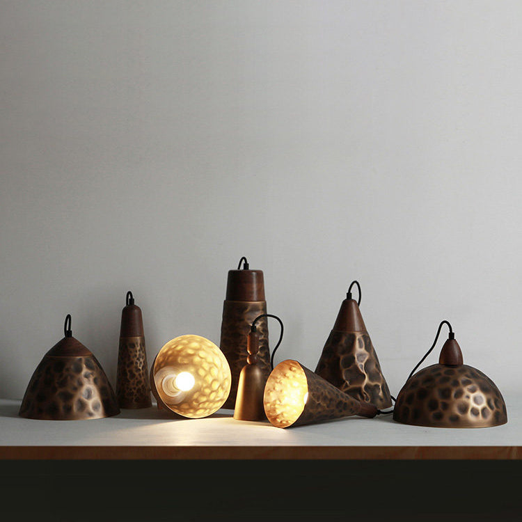 Angled view of the Boyd Pendant Lamp Model D in antique bronze.
