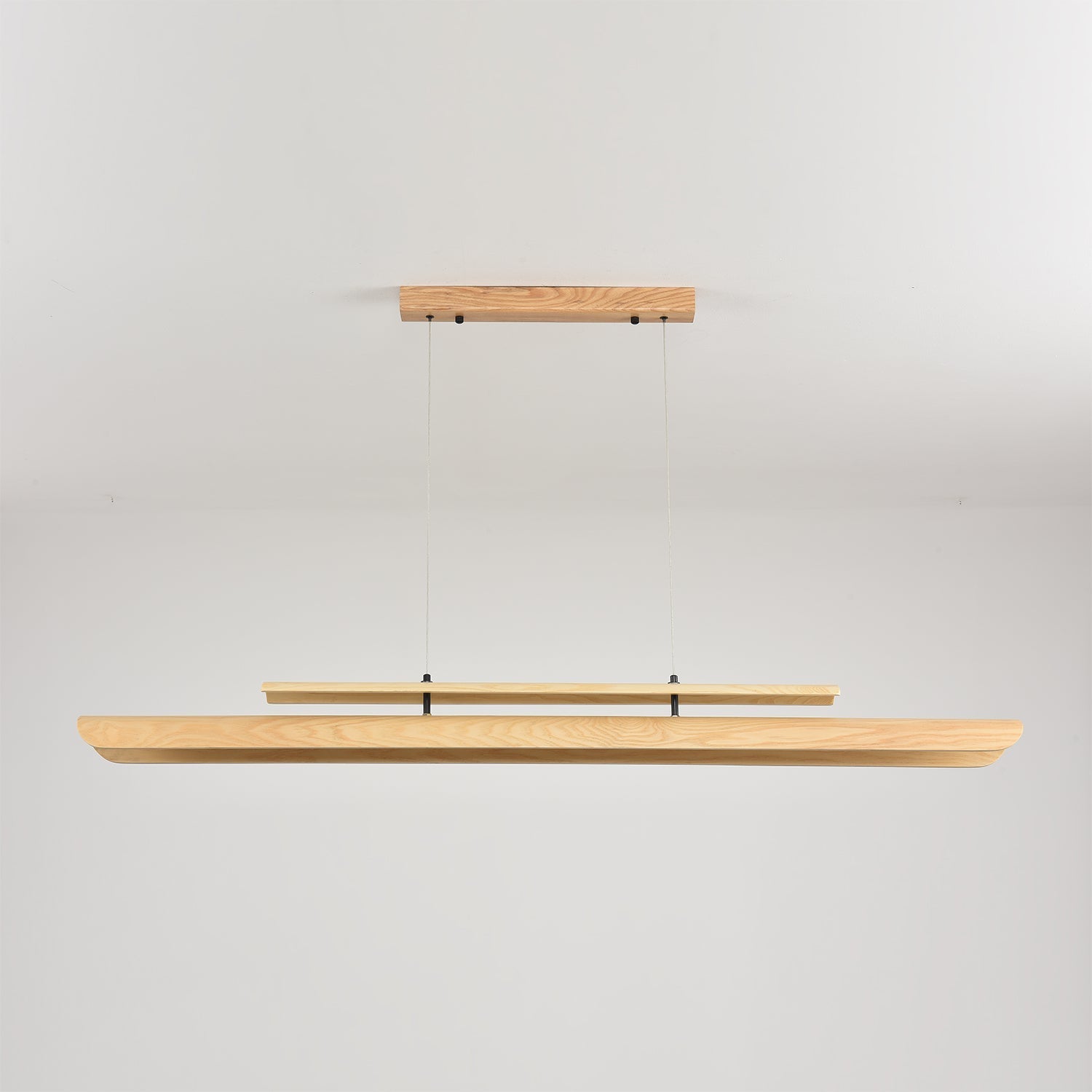 The 120cm version of the chandelier in a compact dining space.