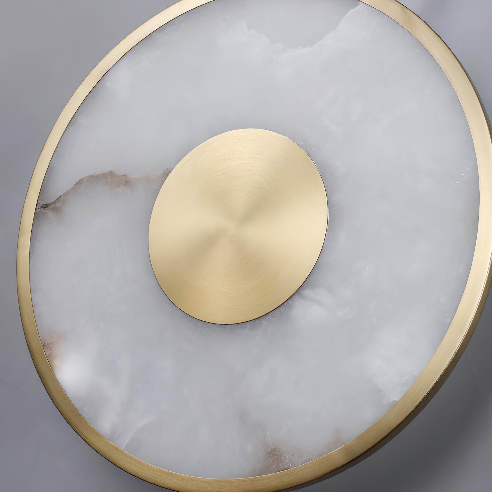 Lifestyle image showing the scale of the Sorle Alabaster Wall Lamp in a living space.