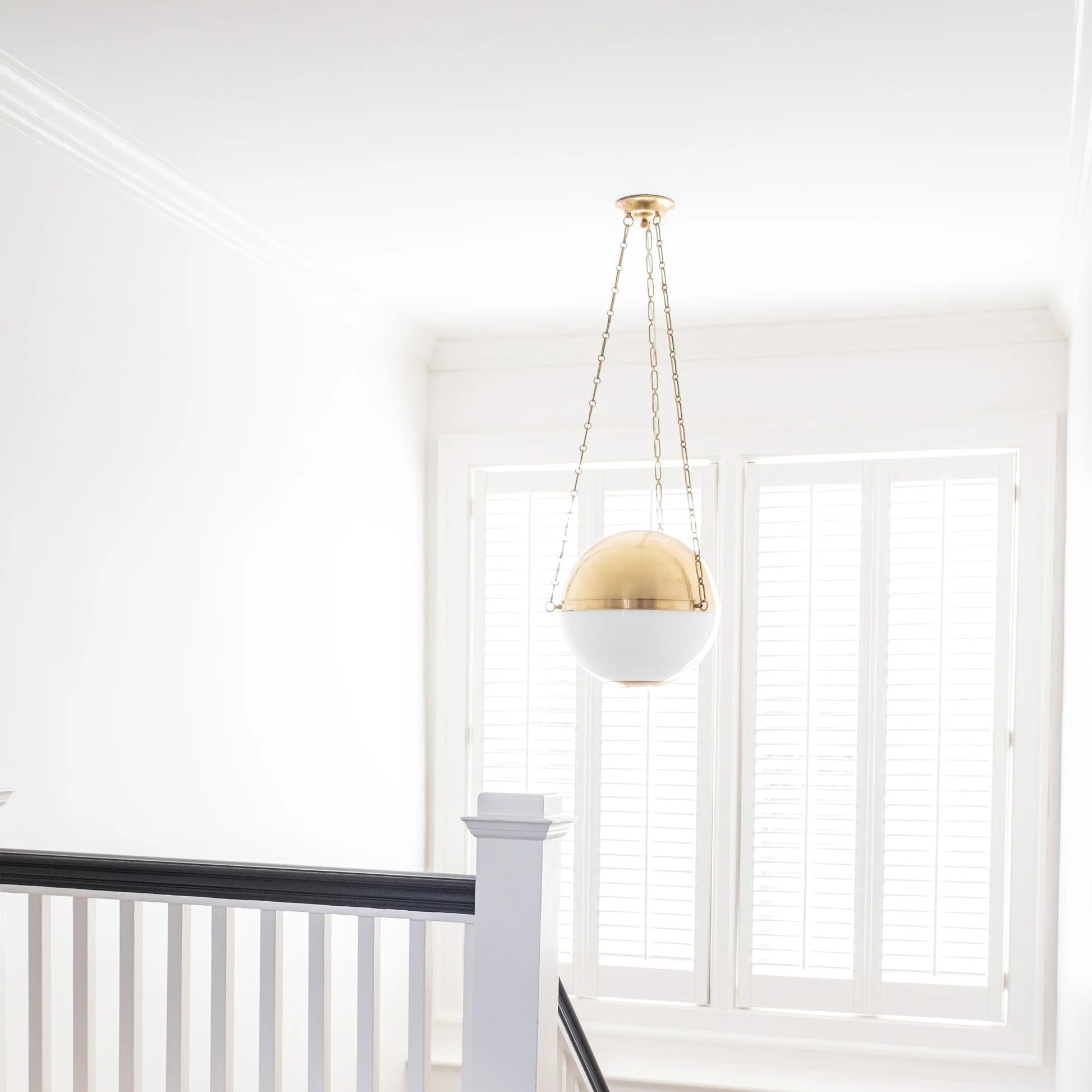 Sphere No.2 Pendant Lamp in white finish against a white background.