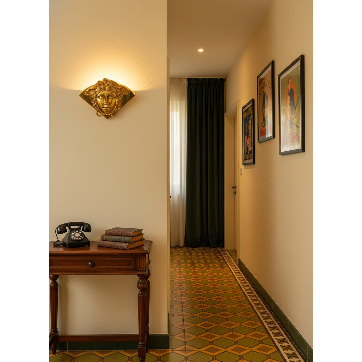 Sphinx Brass Wall Lamp in a minimalist interior design.