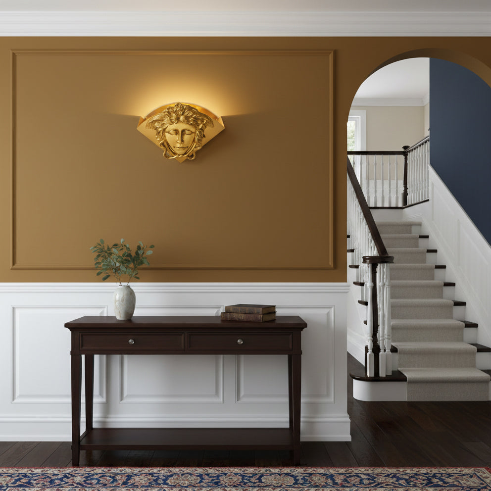 Close-up of the polished brass finish on the Sphinx Wall Lamp.