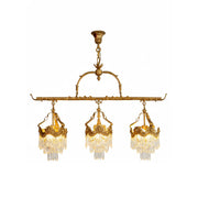 Stained crystal linear pendant lamp against a plain background.