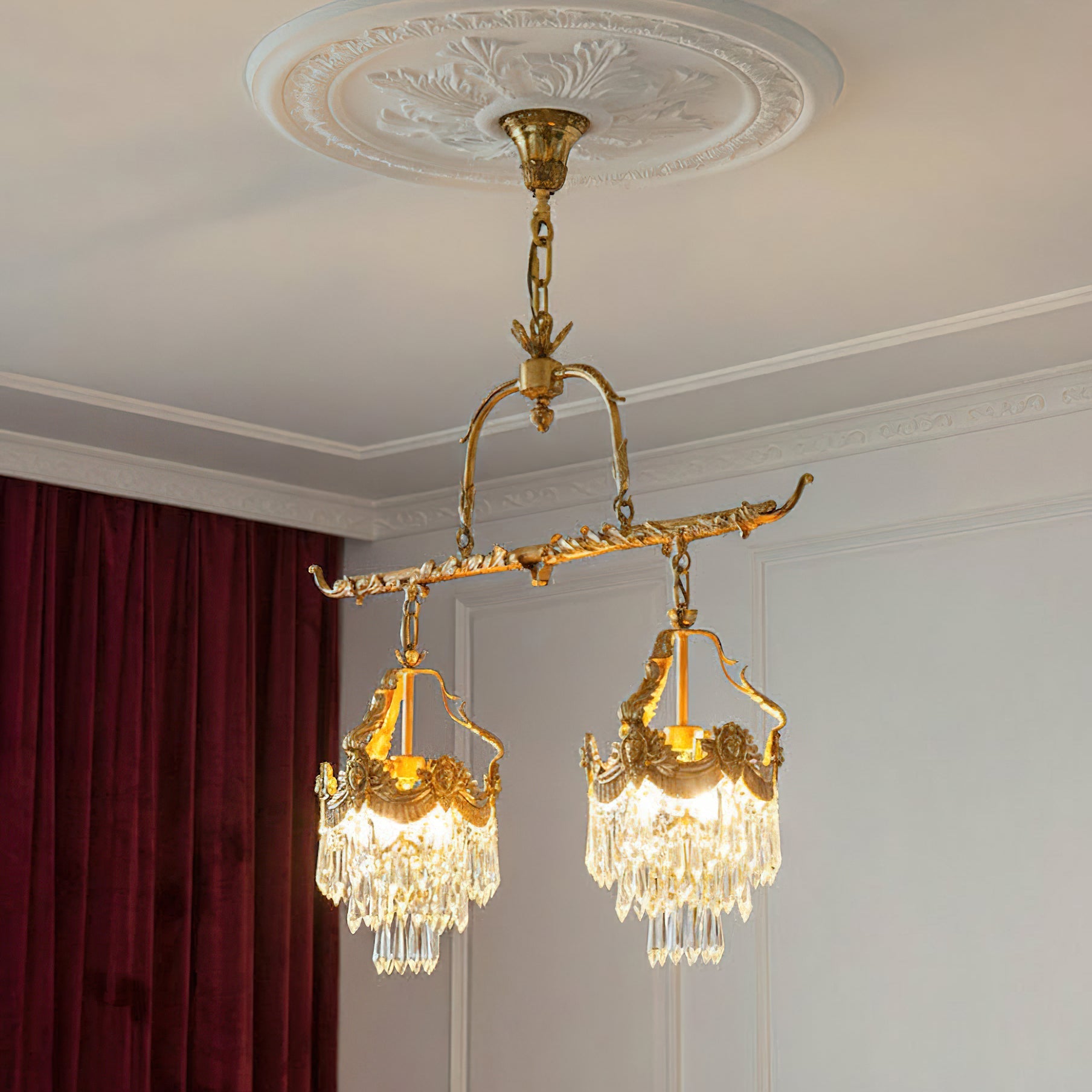 Close-up view of the hand-crafted crystal elements and brass details.