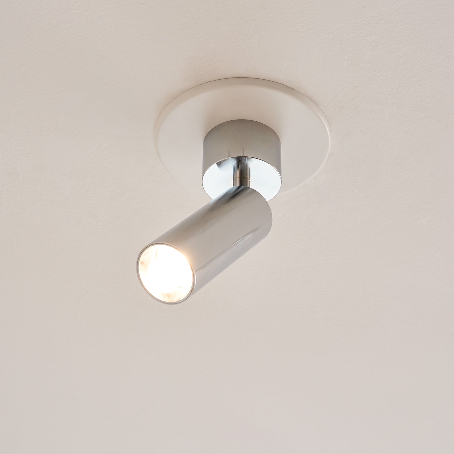 Stanly Ceiling Spotlight Lamp in gold, angled to the side.