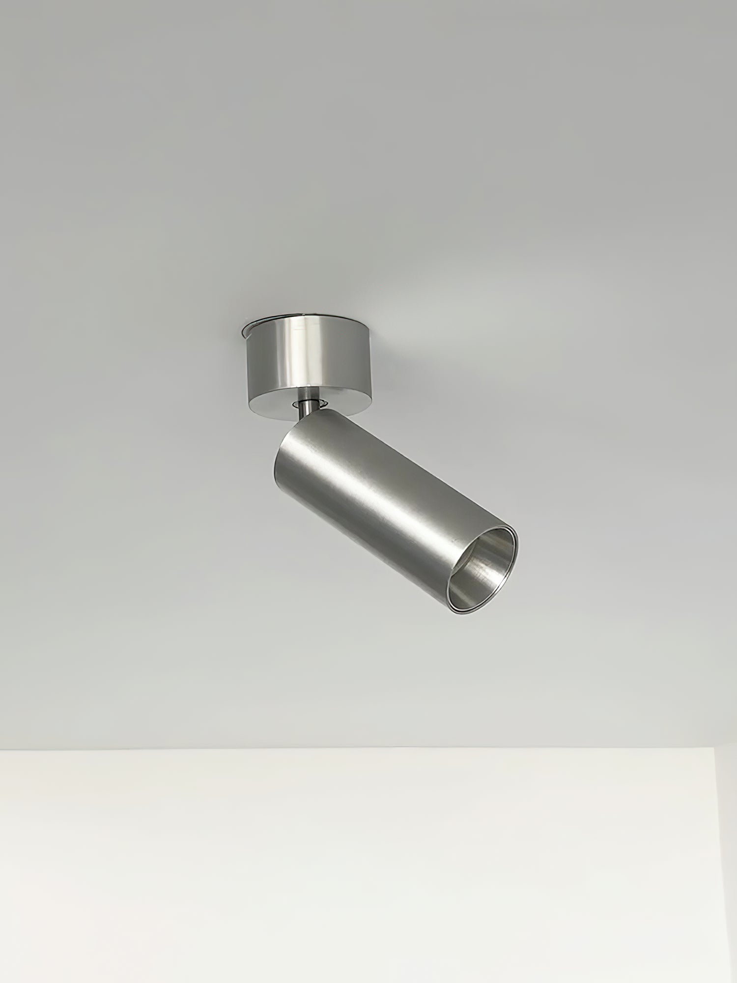 Stanly Ceiling Spotlight Lamp in nickel, showing its compact size.