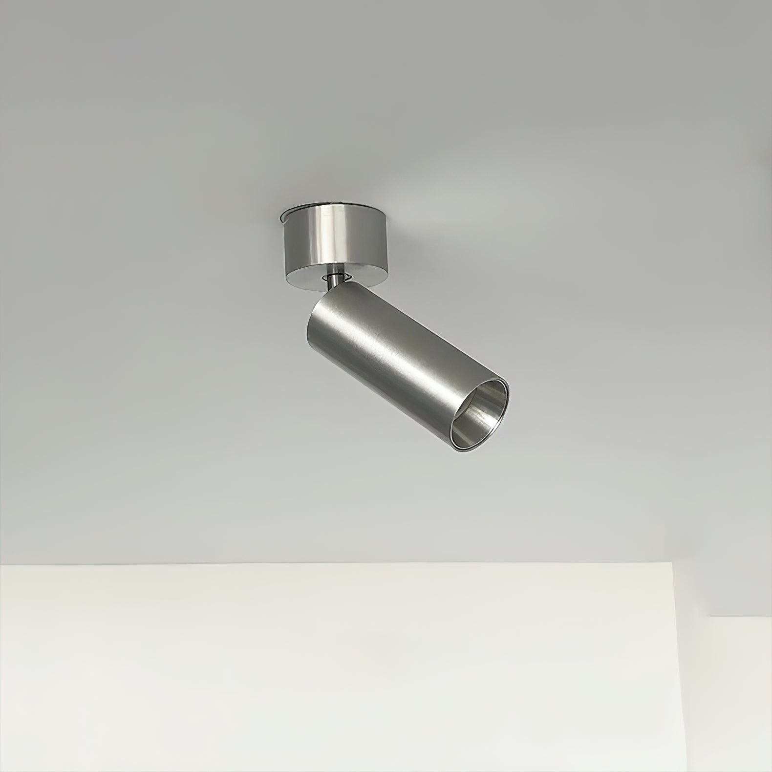 A pair of Stanly spotlights mounted on a ceiling.