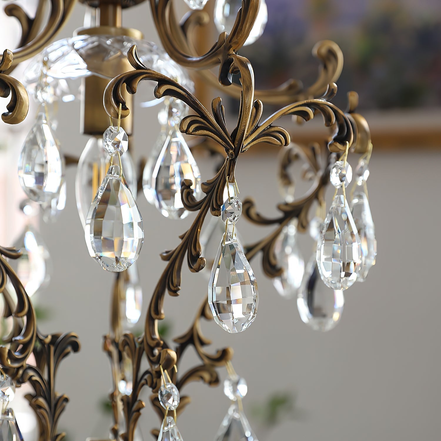 The Stars Tears Chandelier as a focal point in a master bedroom.