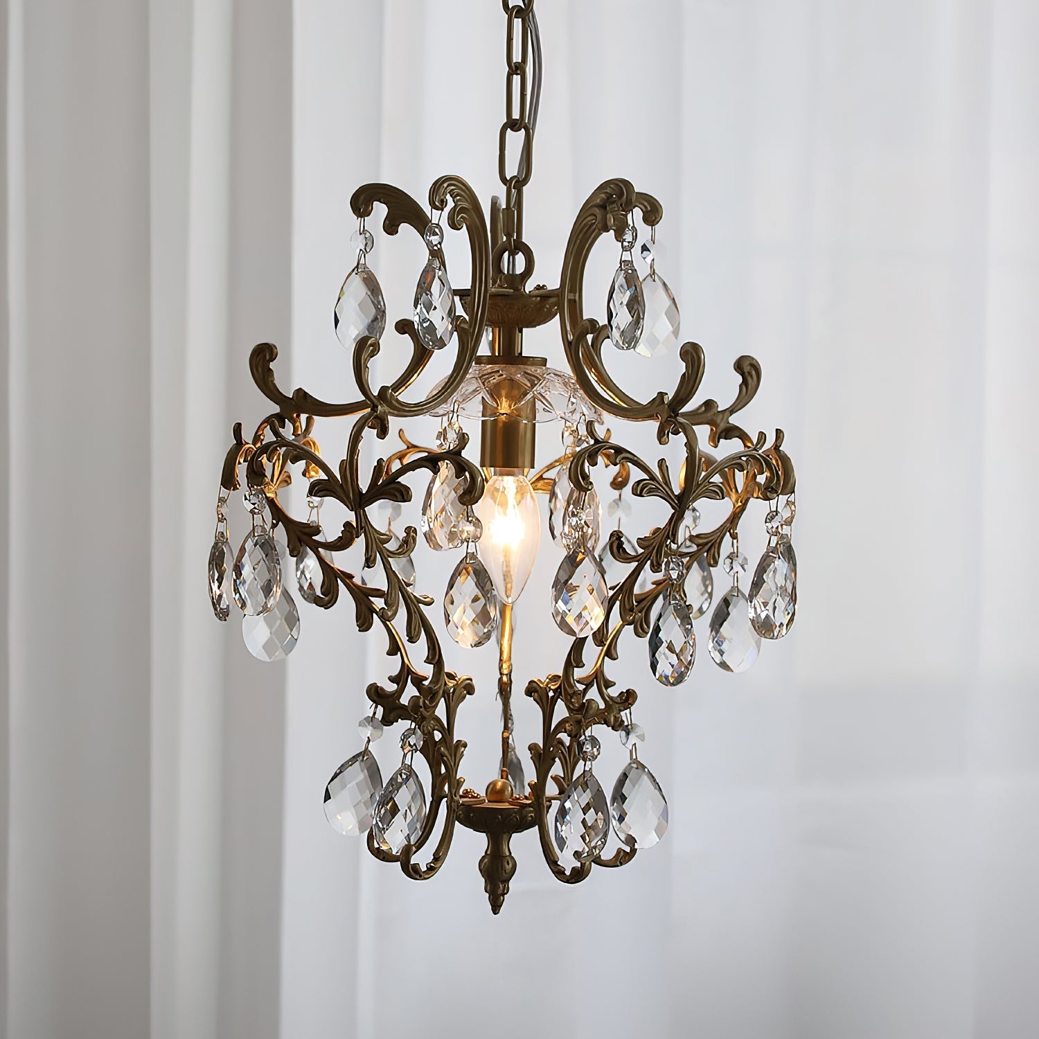 The Stars Tears Chandelier hanging in a sophisticated living room setting.