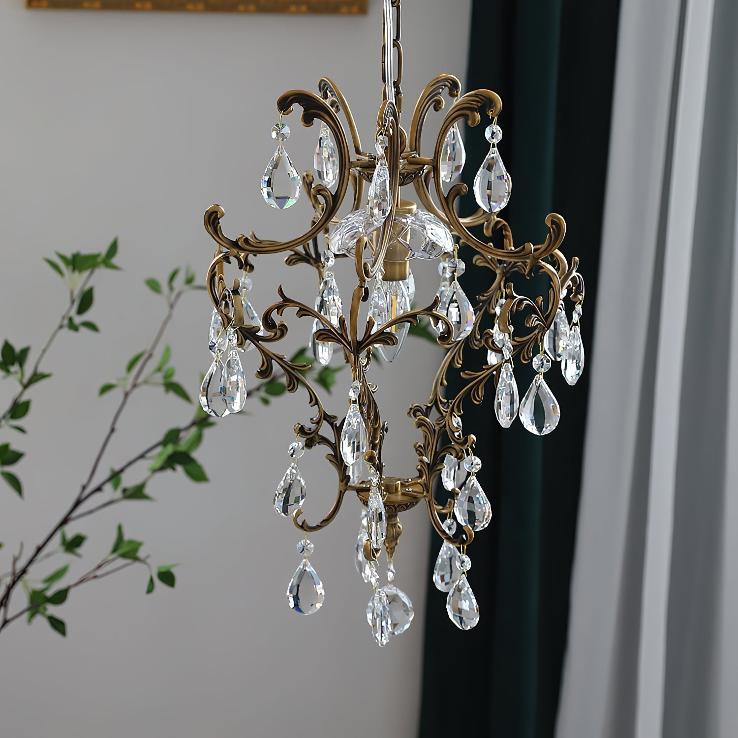 The chandelier shown in a high-ceiling entryway.