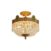 Stinnett Ceiling Lamp with brass body and crystal shades.