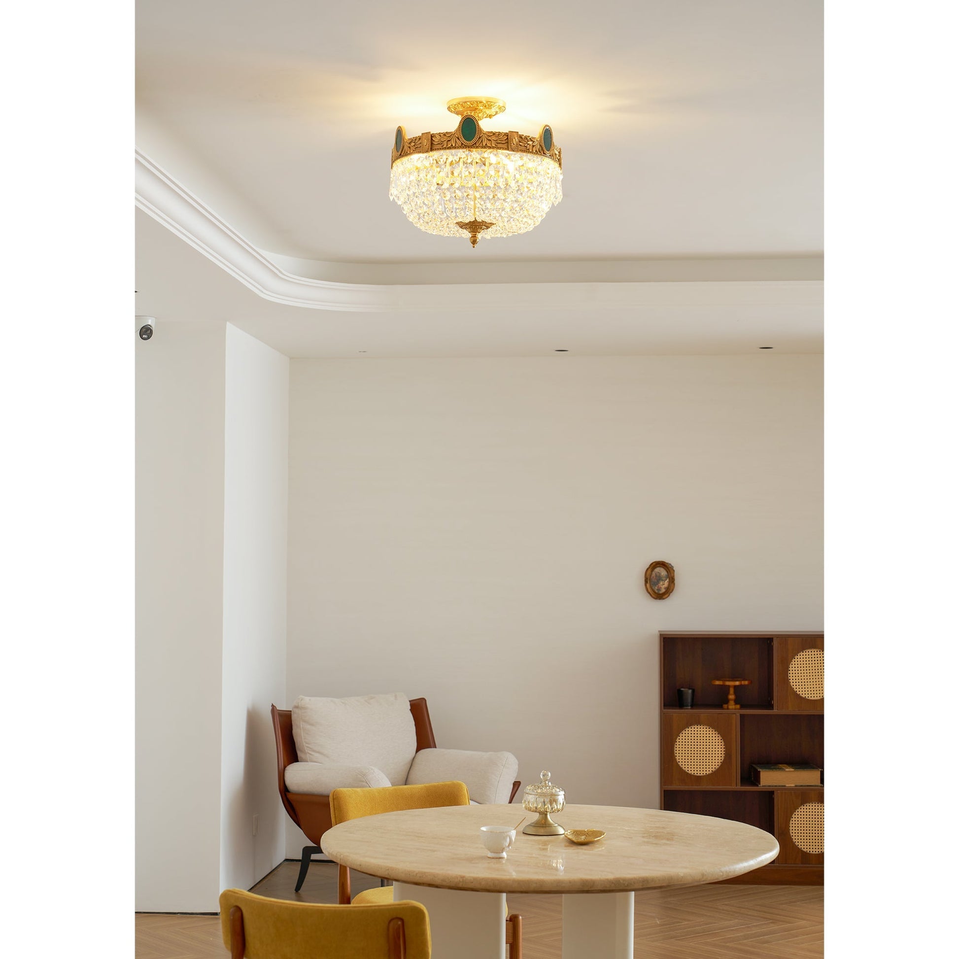 The sleek brass structure of the Stinnett Ceiling Lamp.