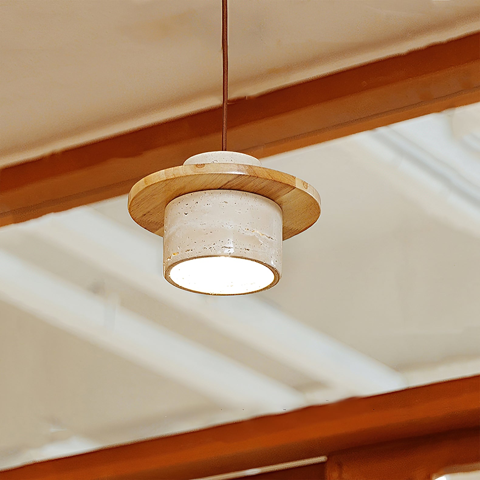 Close-up of the natural travertine texture on the Stonova Duo Pendant Lamp.
