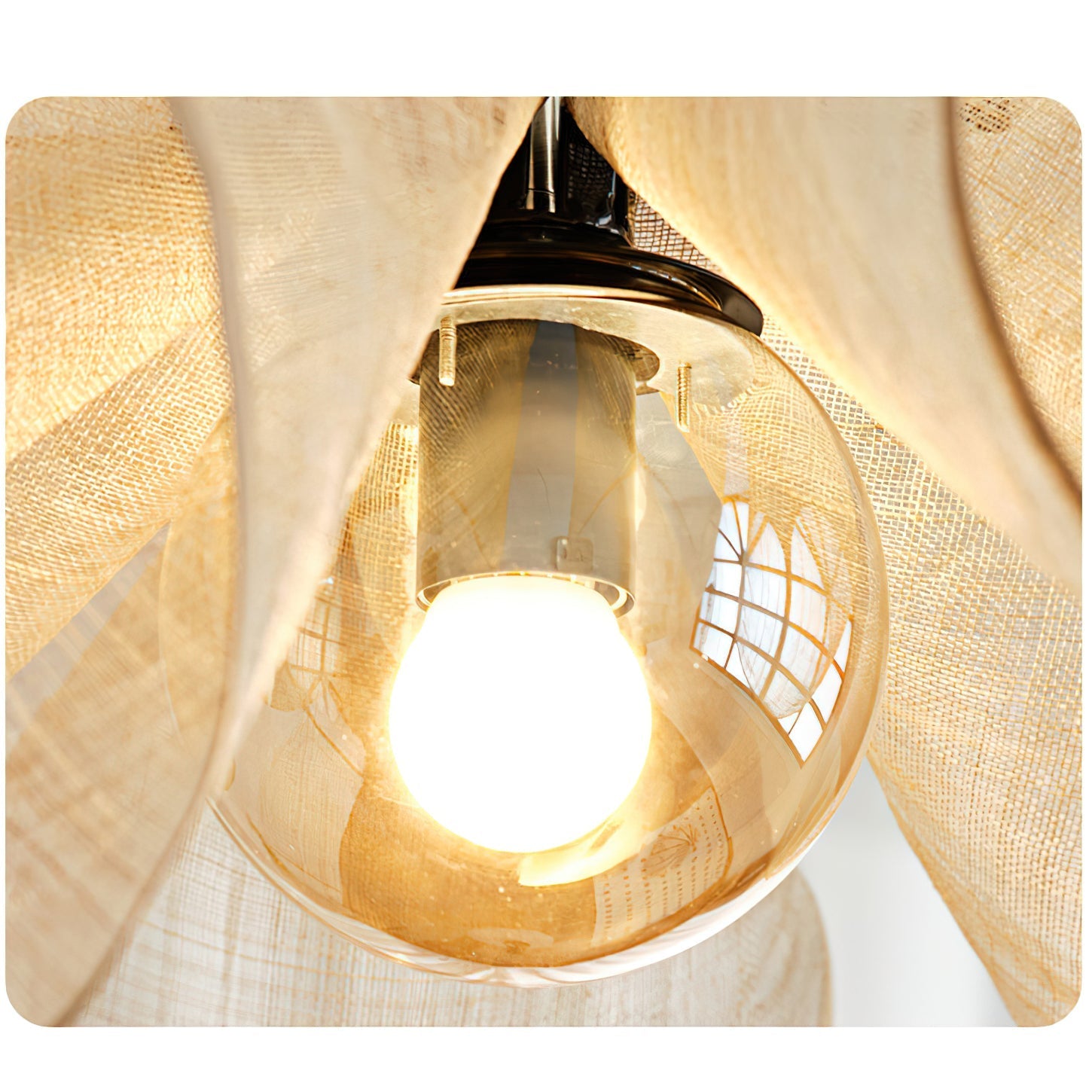 The light brown pendant lamp illuminated, casting a warm glow.