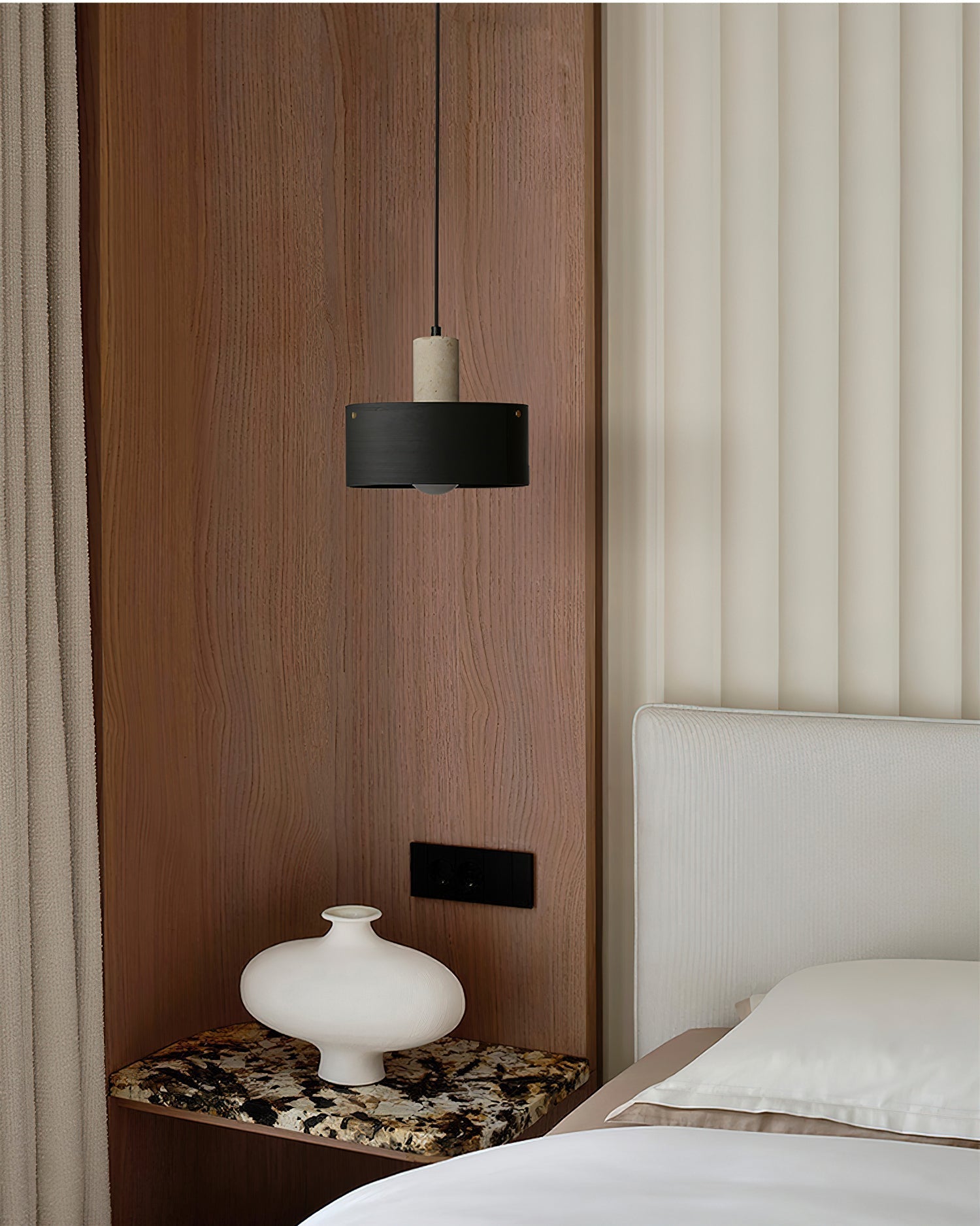 A series of Tako Pendant Lamps hanging in a row for a dramatic effect.