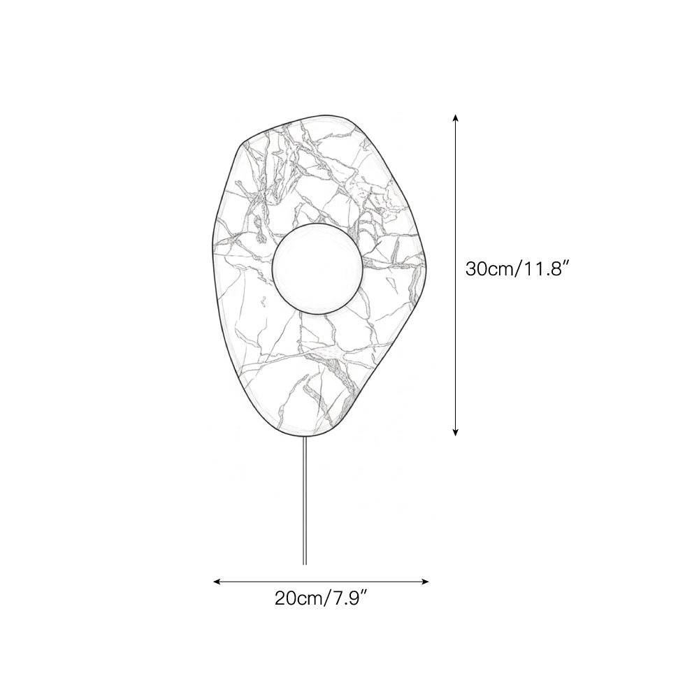 The wall lamp illuminated, casting a warm and even glow.