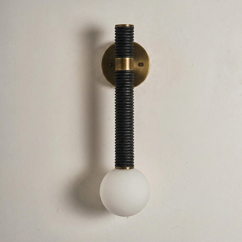 Full view of the black leather Threadline Globe Wall Sconce.