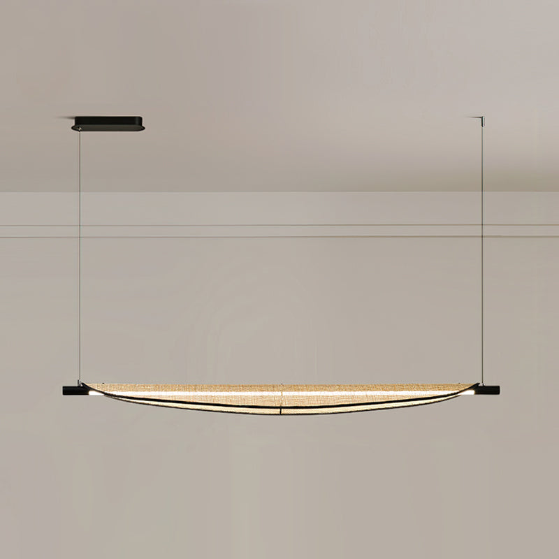 The warm glow from the Thula chandelier creating an inviting atmosphere.