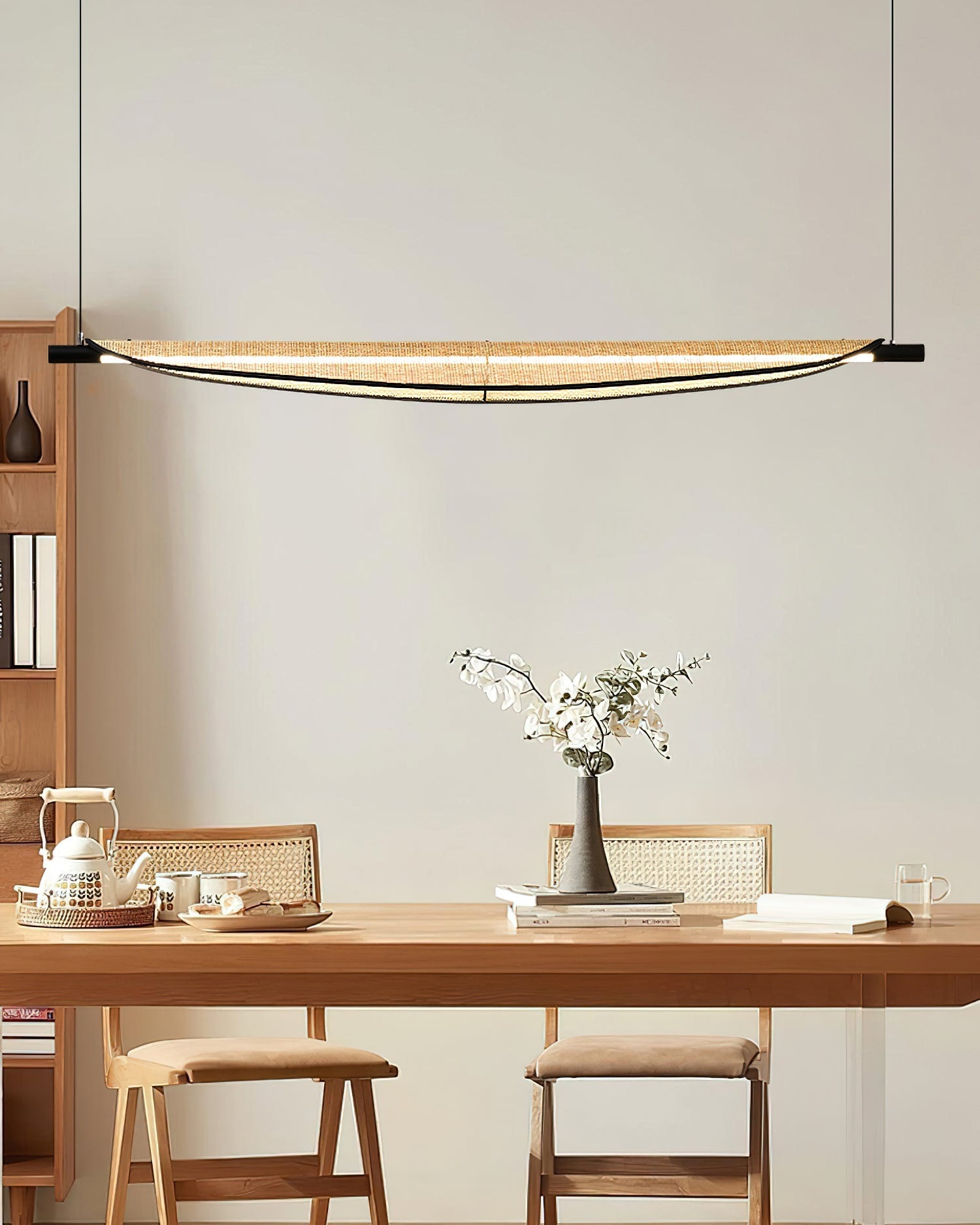 The three available sizes of the Thula Linear Chandelier shown together.
