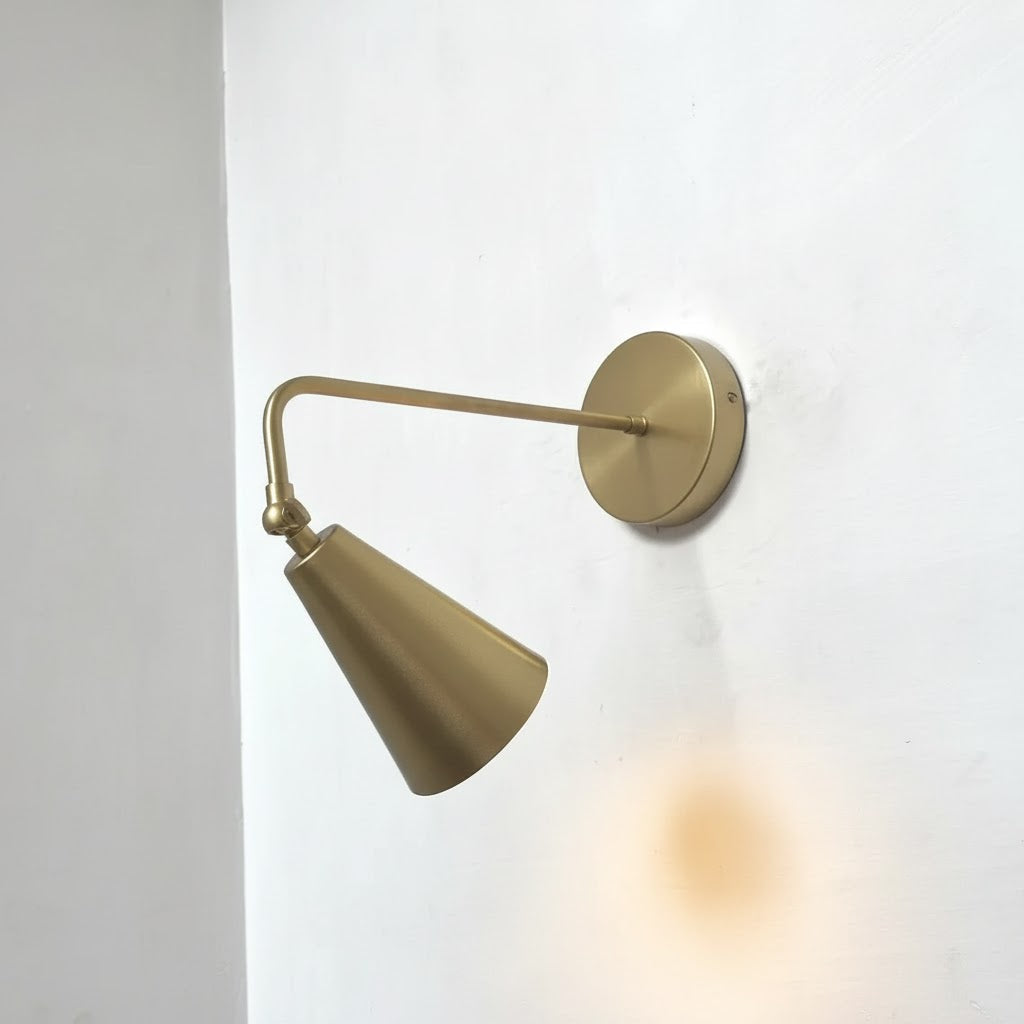 Lifestyle image of the lamp in a modern bedroom setting.
