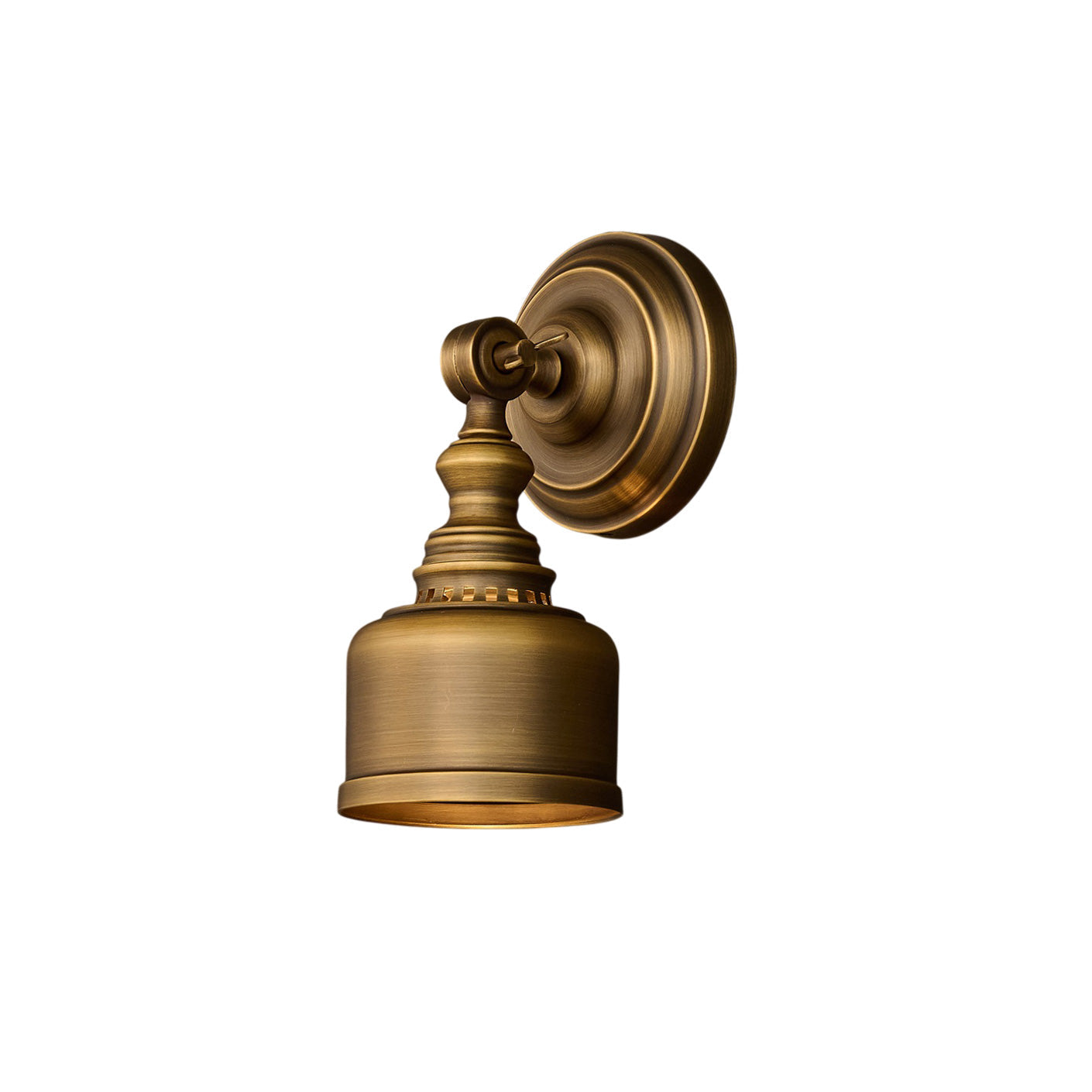 Timarron Wall Lamp in antique brass finish shown against a light wall.