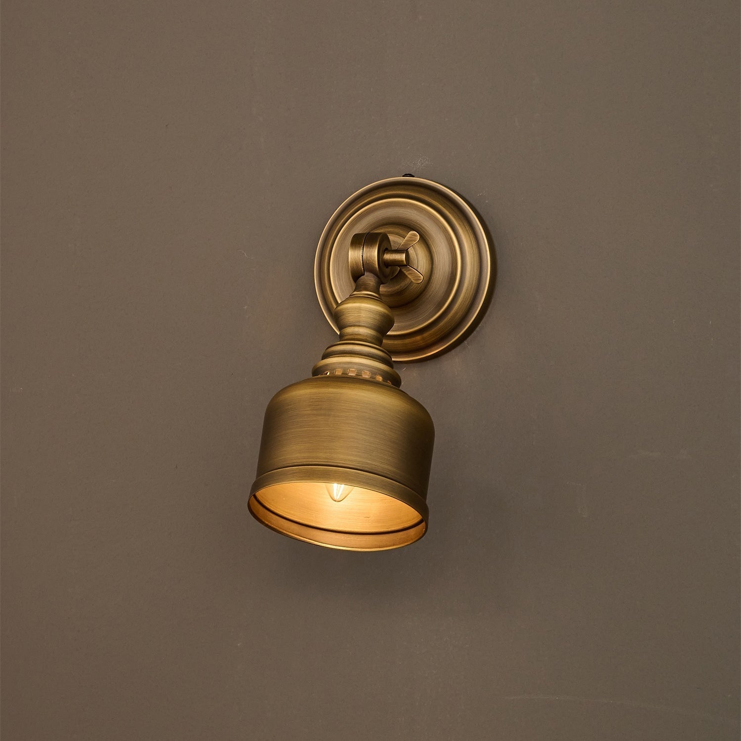 Unboxing view of the Timarron Wall Lamp and its components.