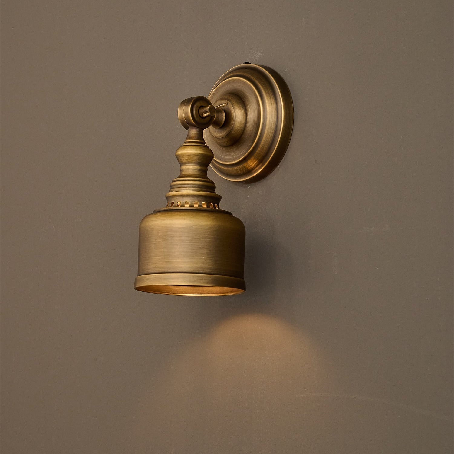 The lamp shown with a candelabra LED globe bulb.