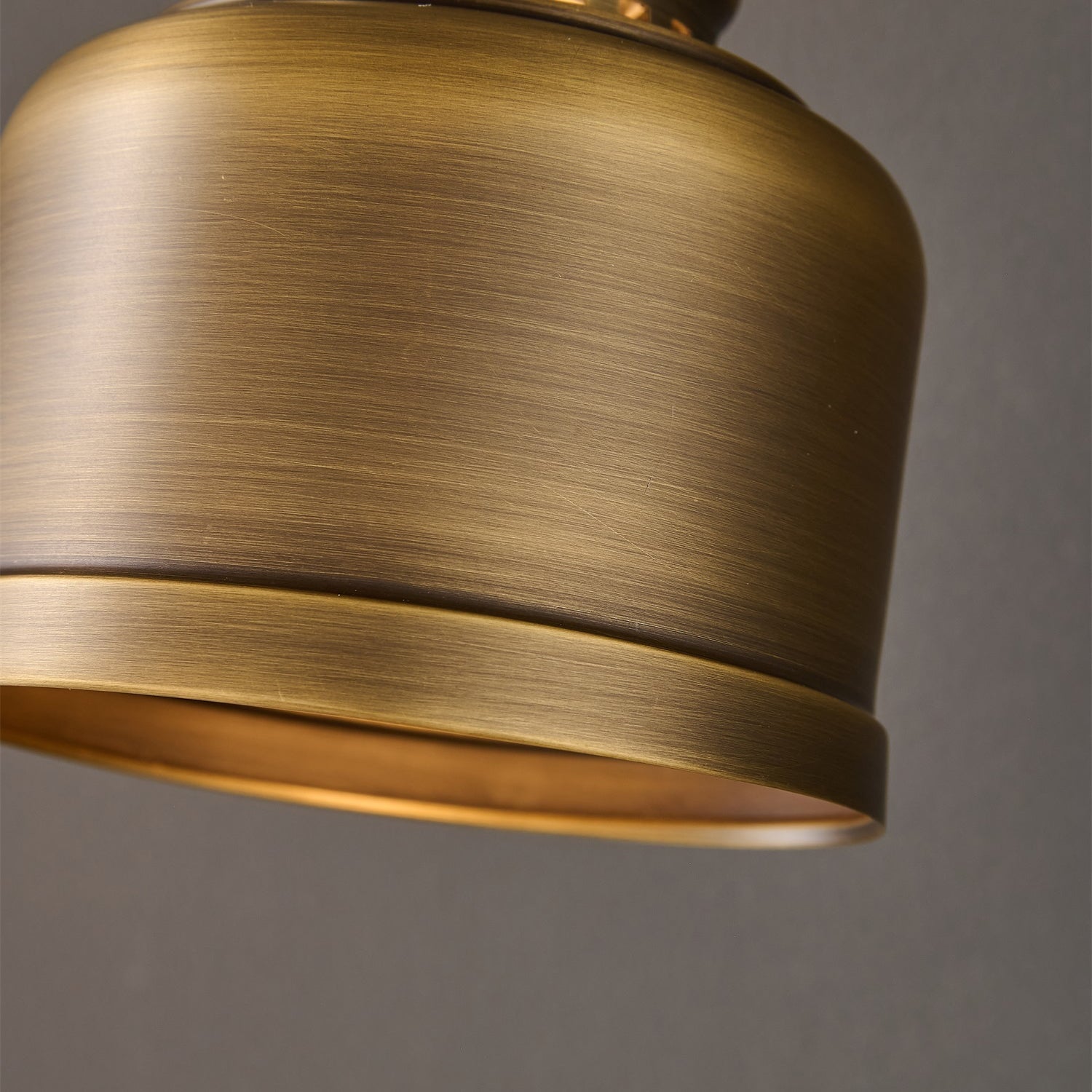 The lamp's reflection on a glossy surface.