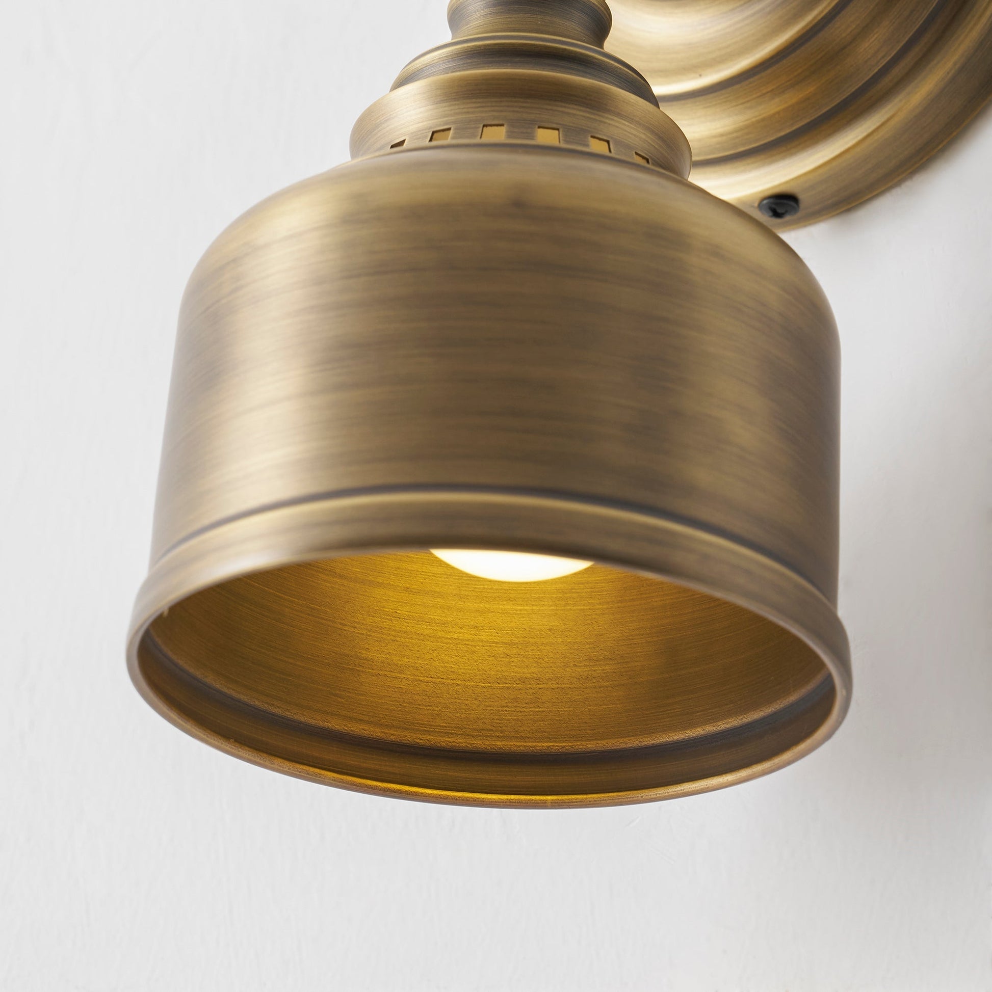 Final installed view of the Timarron Wall Lamp in a home.