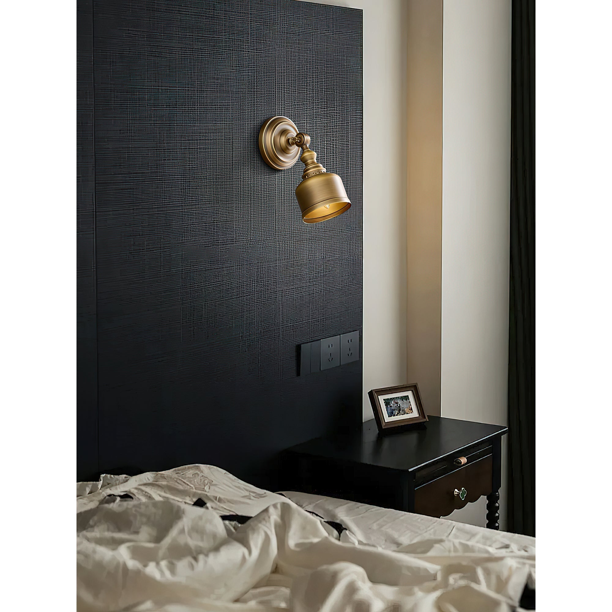 Lifestyle image of the Timarron Wall Lamp next to a doorway.