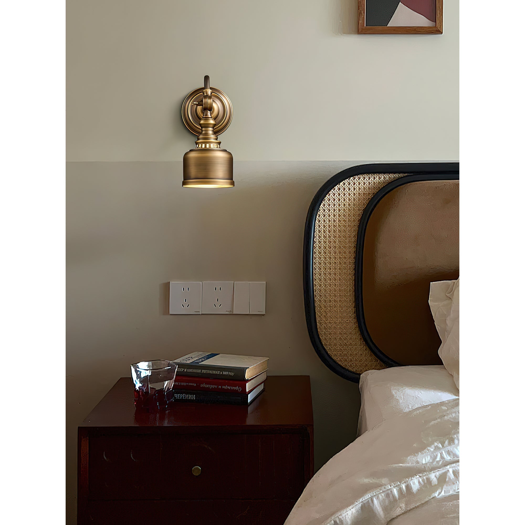 A pair of Timarron Wall Lamps flanking a mirror in a bathroom.