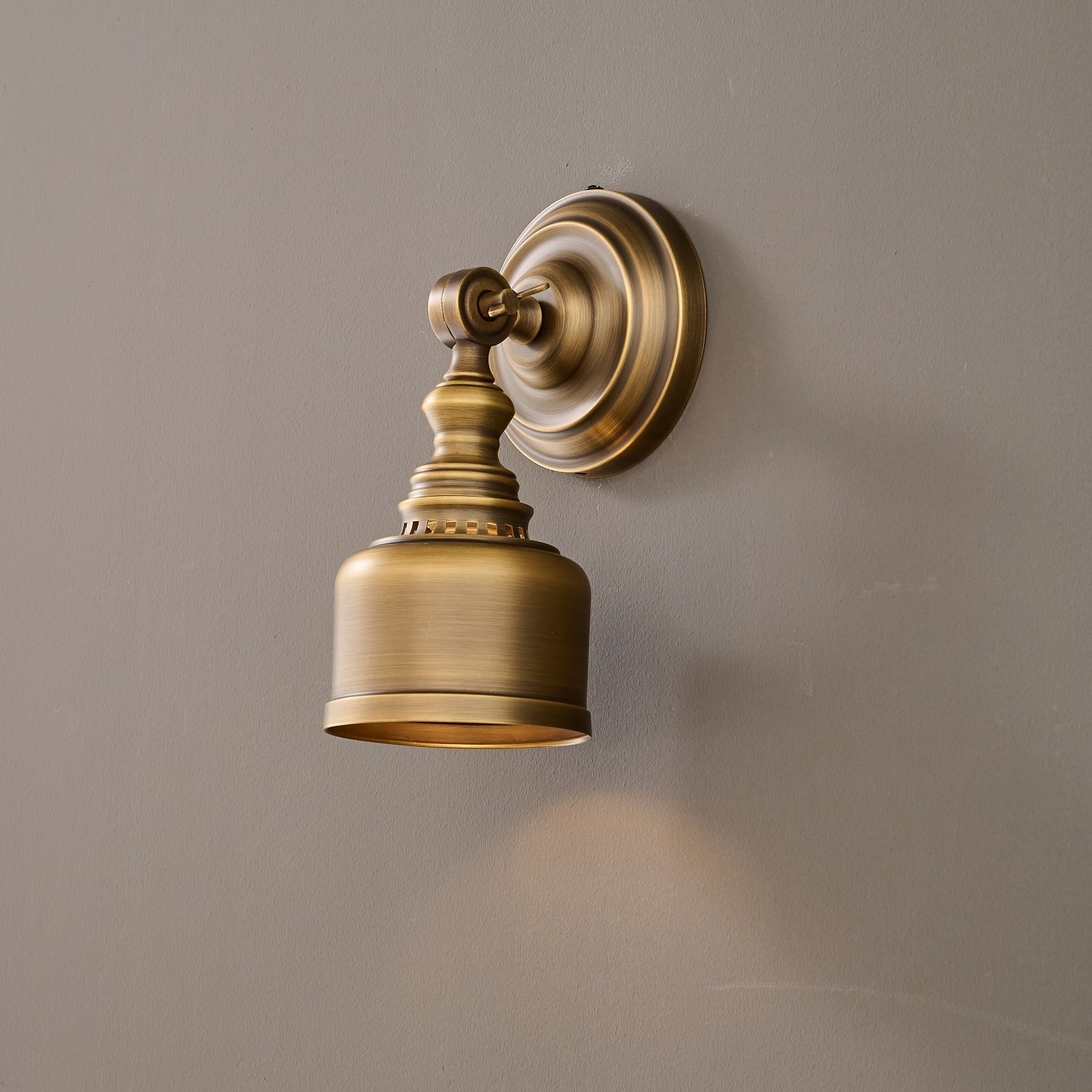 The lamp shown with a vintage Edison filament bulb installed.