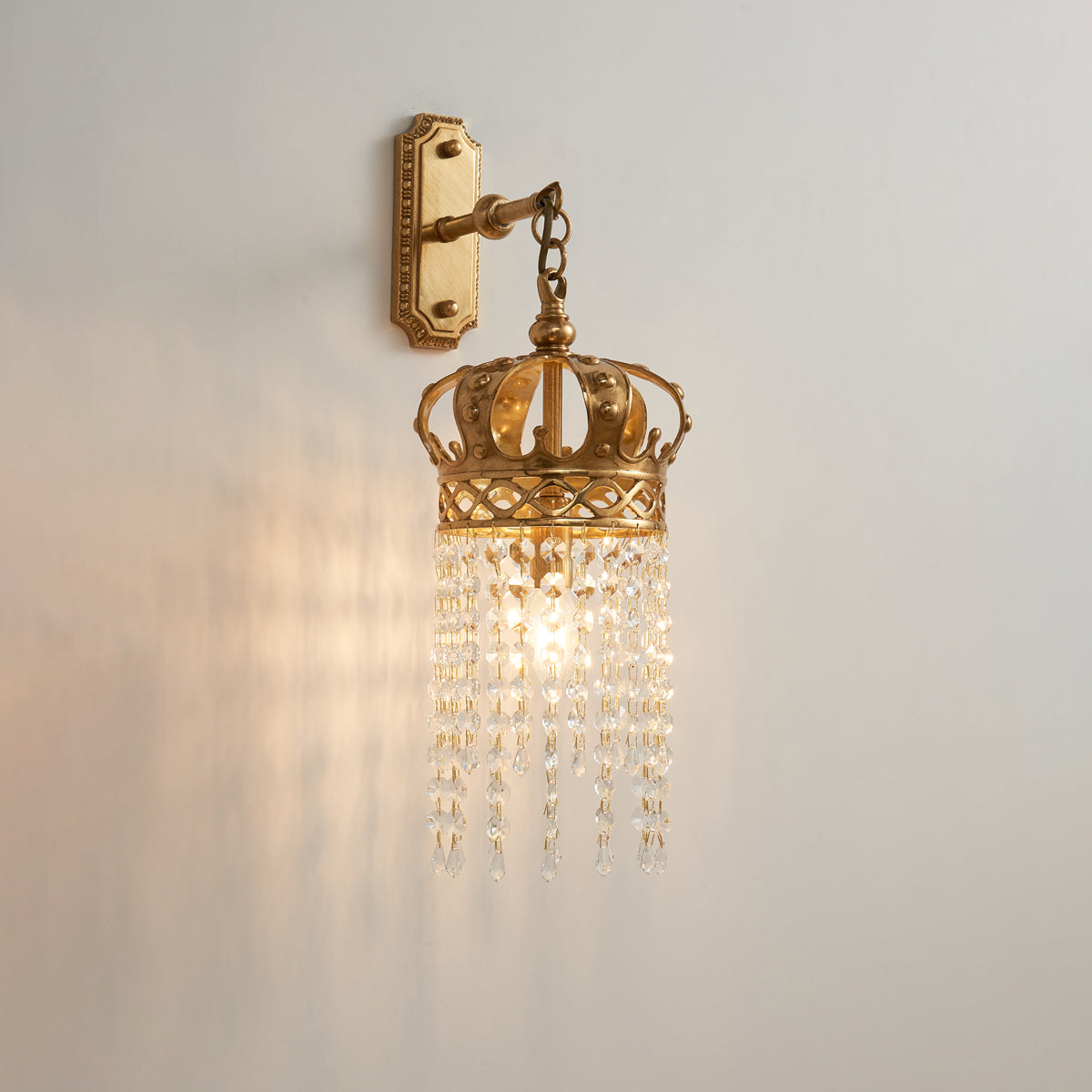 Another close-up of the intricate crystal and brass work.