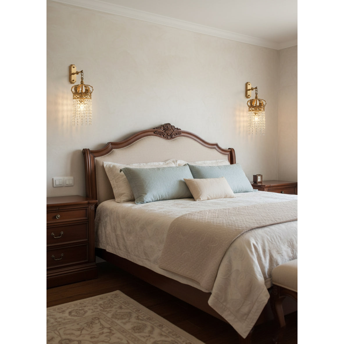 The Timon wall lamp illuminated, casting a warm, shimmering light.