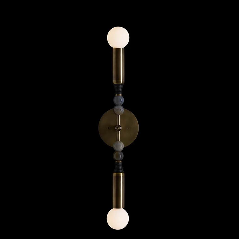 Lit Toam Double Wall Lamp demonstrating illumination.