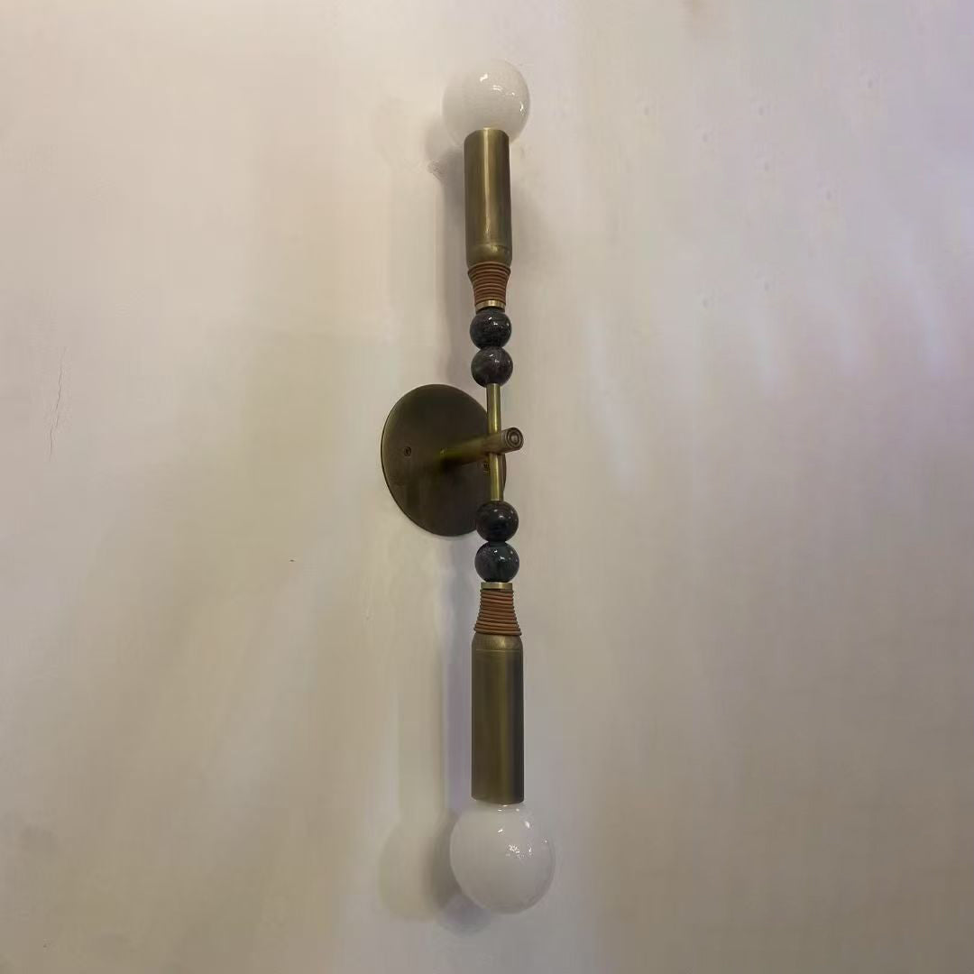 Toam Double Wall Lamp, brass finish, front view.