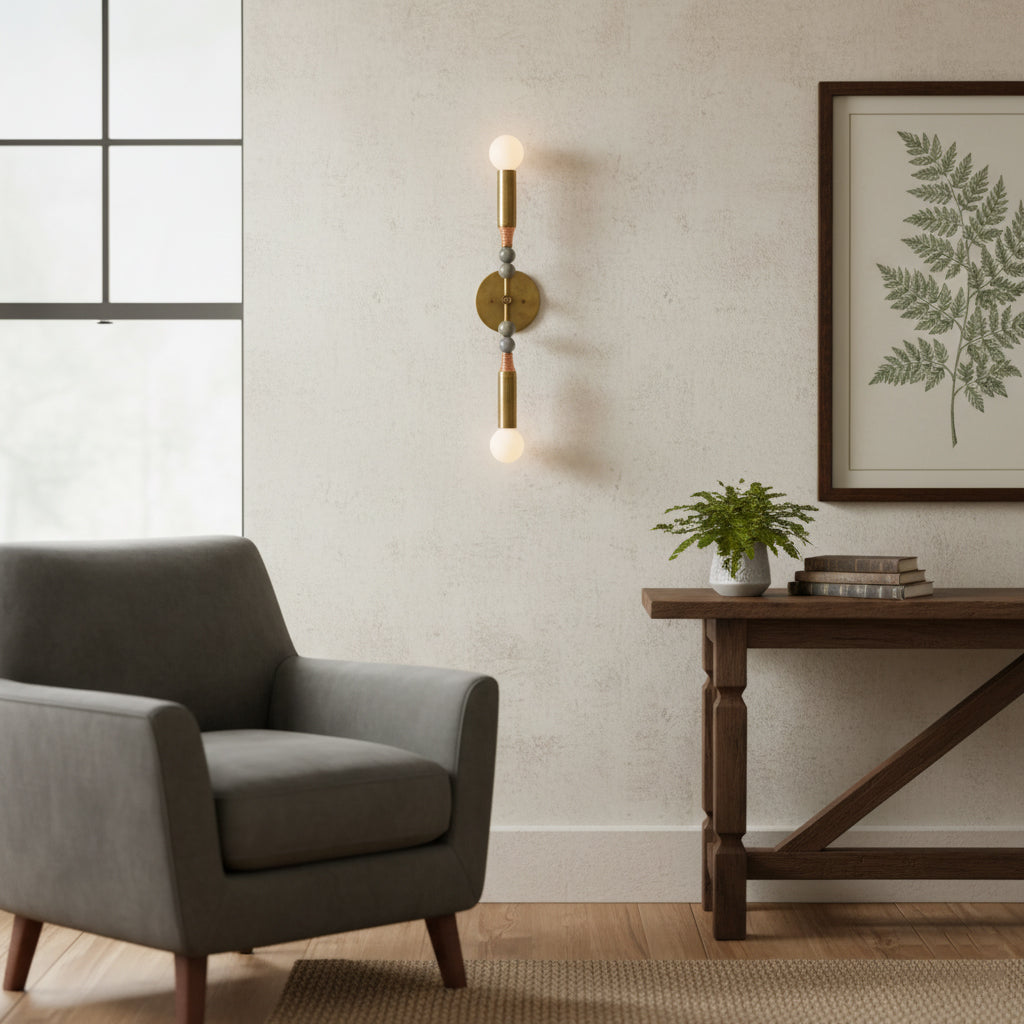 Close-up of the Toam Double Wall Lamp's marble detail.