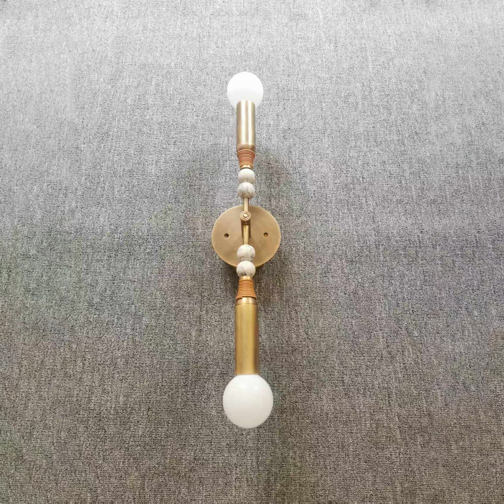 The two light sources of the Toam Double Wall Lamp.