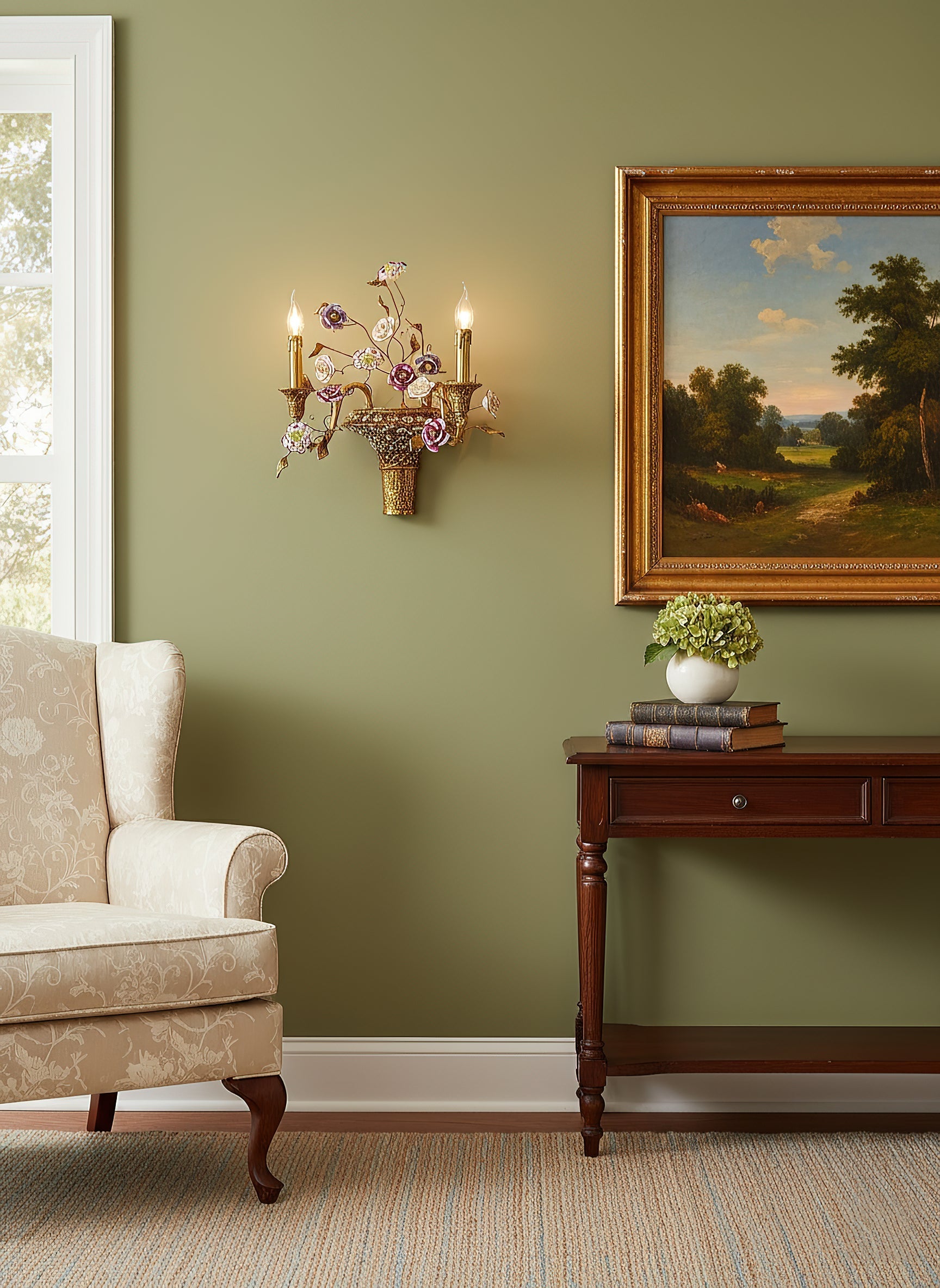 Close-up view of the delicate ceramic flower details on the wall lamp.