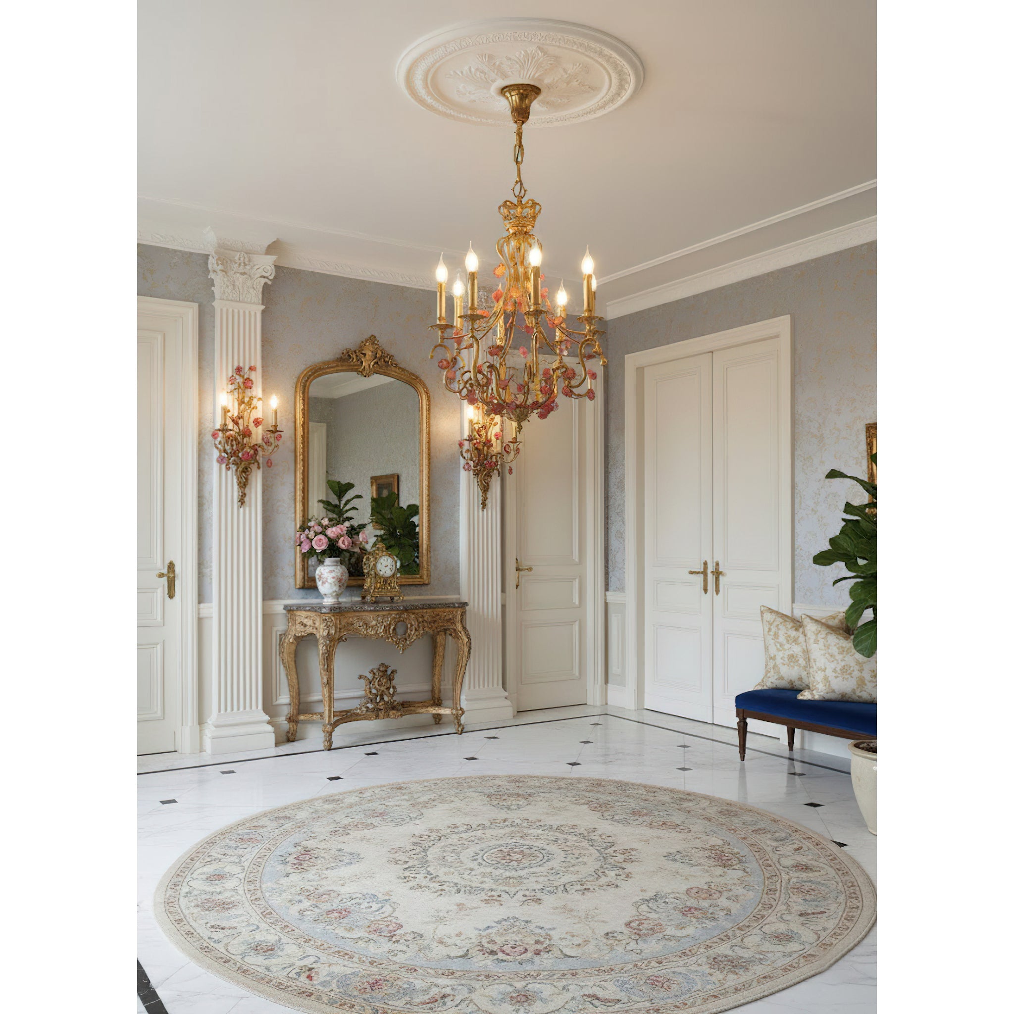 The top crown and canopy of the gilt brass chandelier.