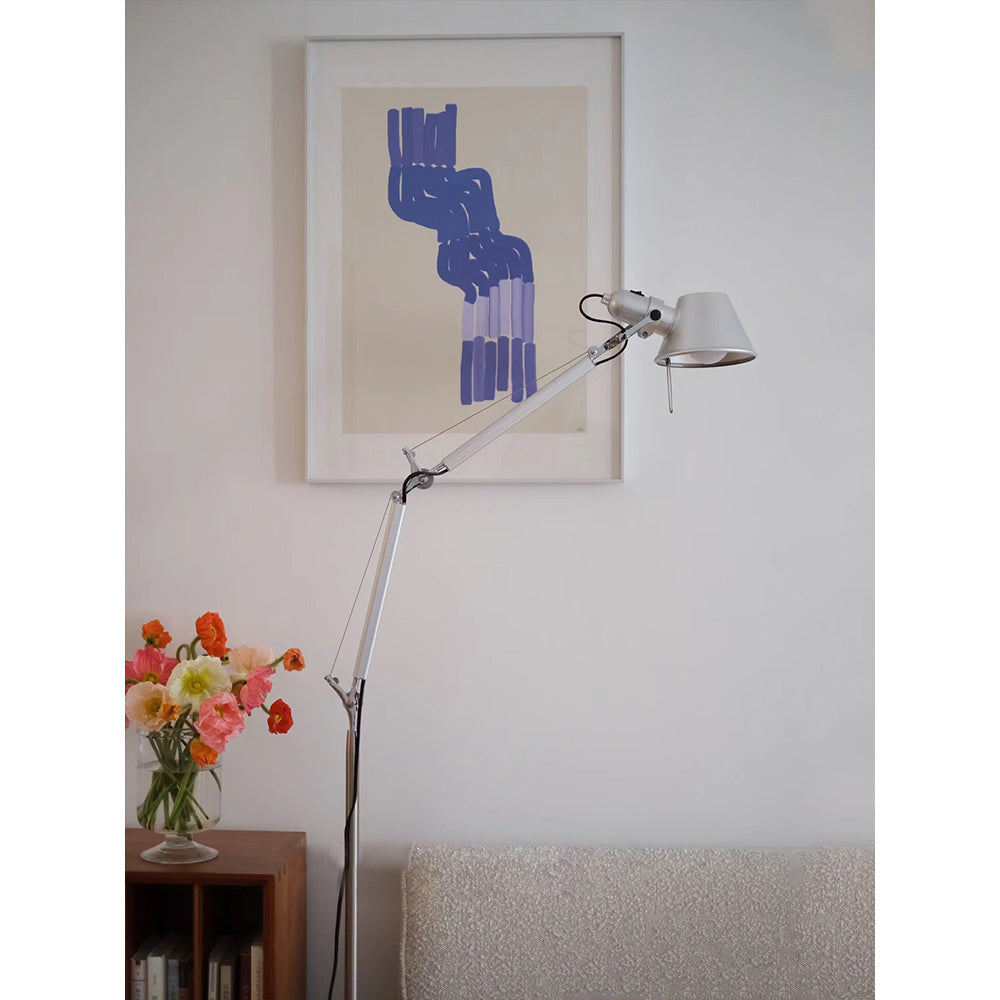 The lamp base and lower pole in black finish.