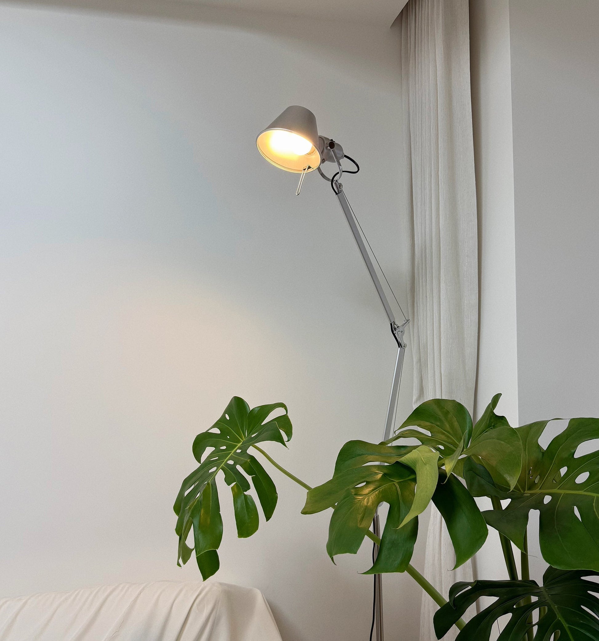 Brady Rocker Arm Floor Lamp in silver finish.