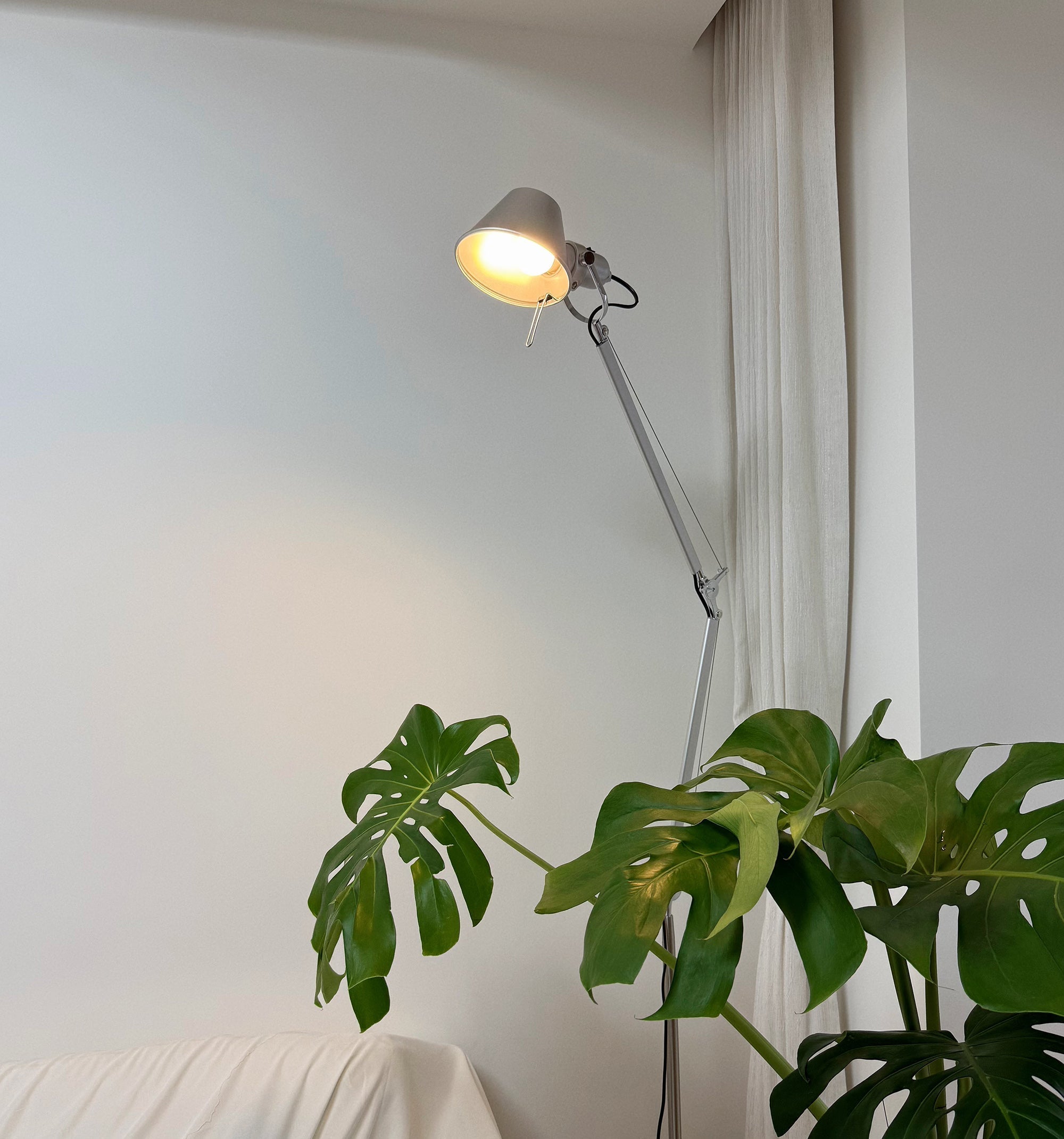 Brady Rocker Arm Floor Lamp in silver finish.