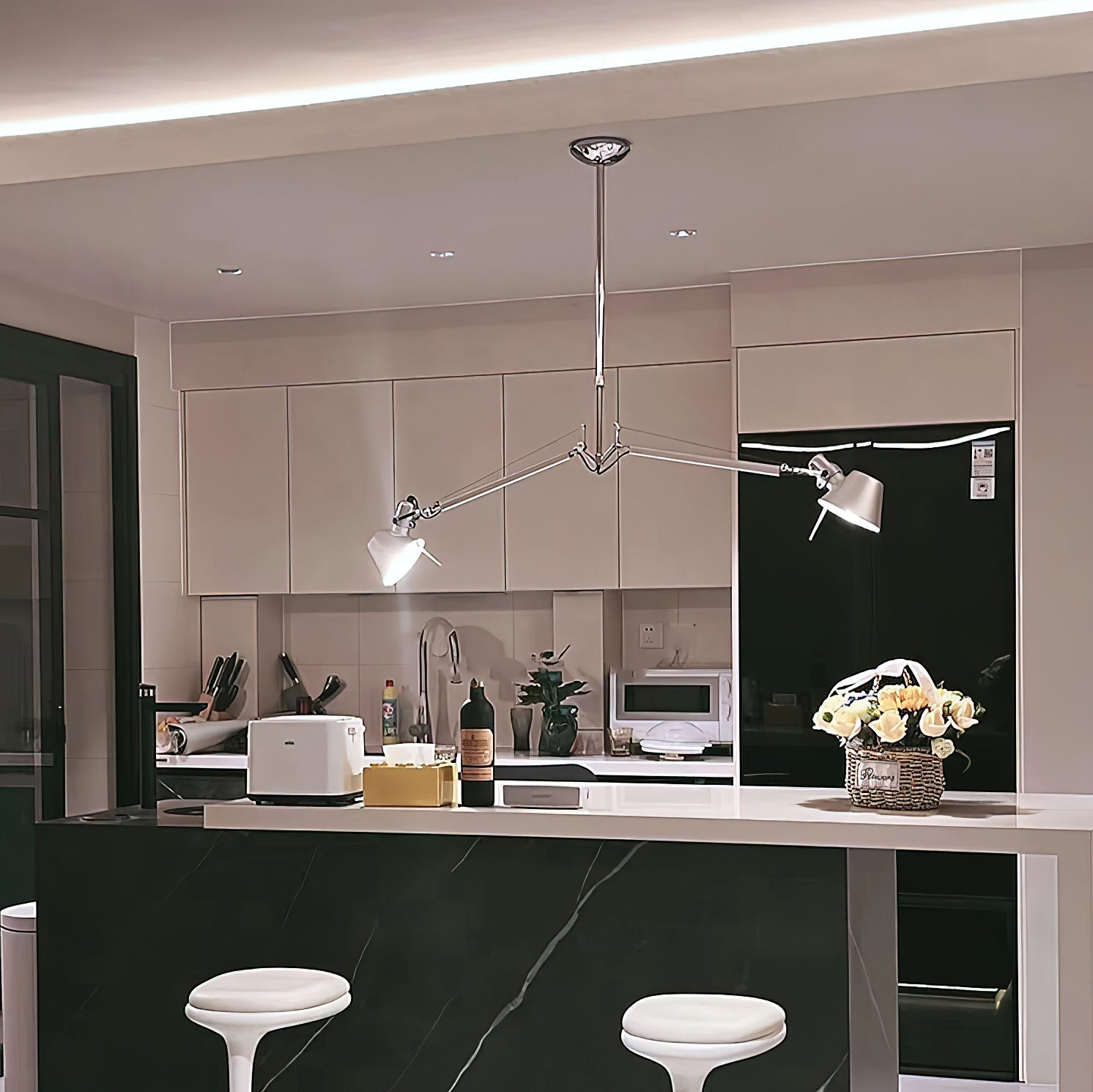 Angled view of the Brady Rocker Arm Pendant Lamp against a neutral background.