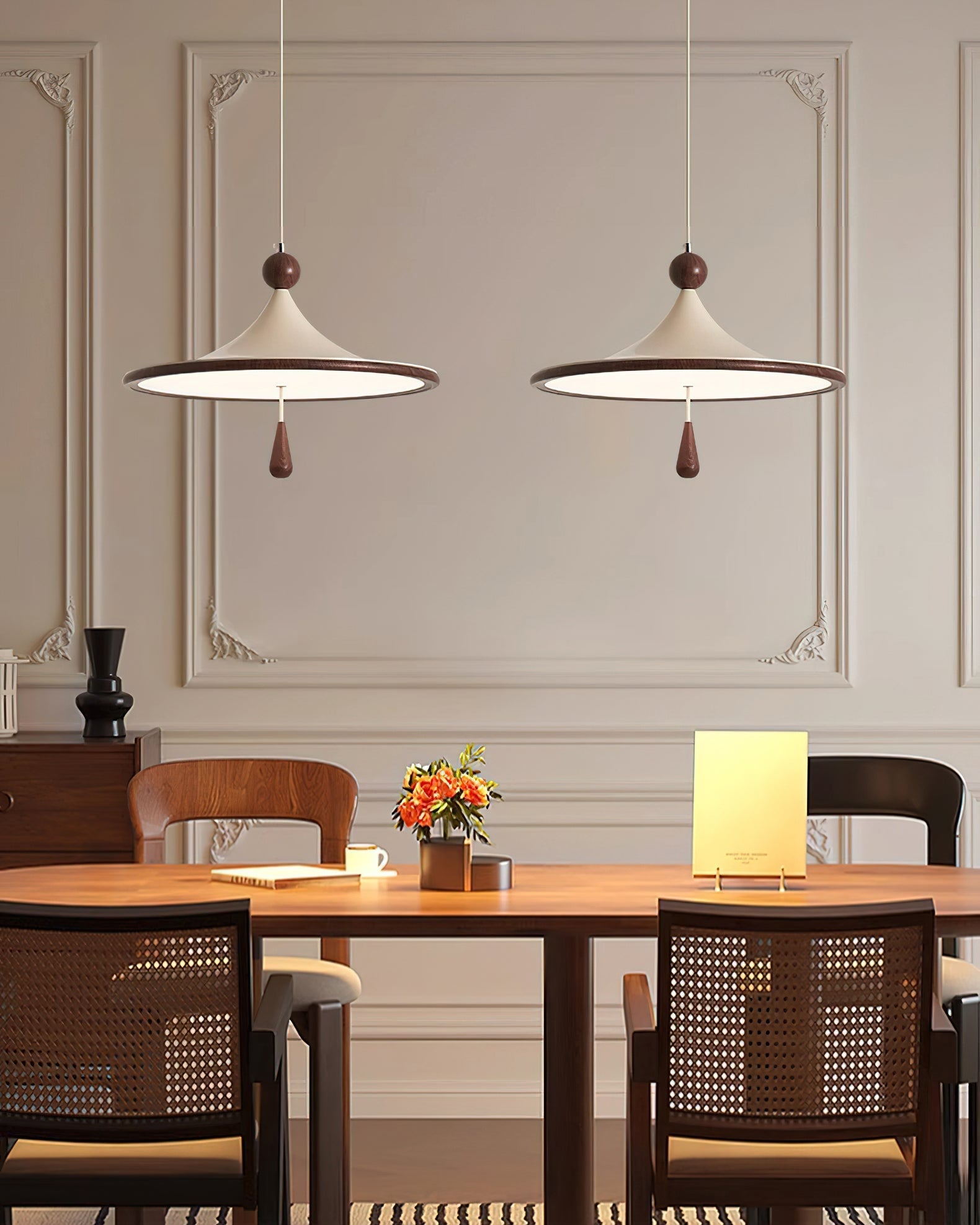 Detail of the ceiling mount and suspension wire for the Tomaso Pendant Light.