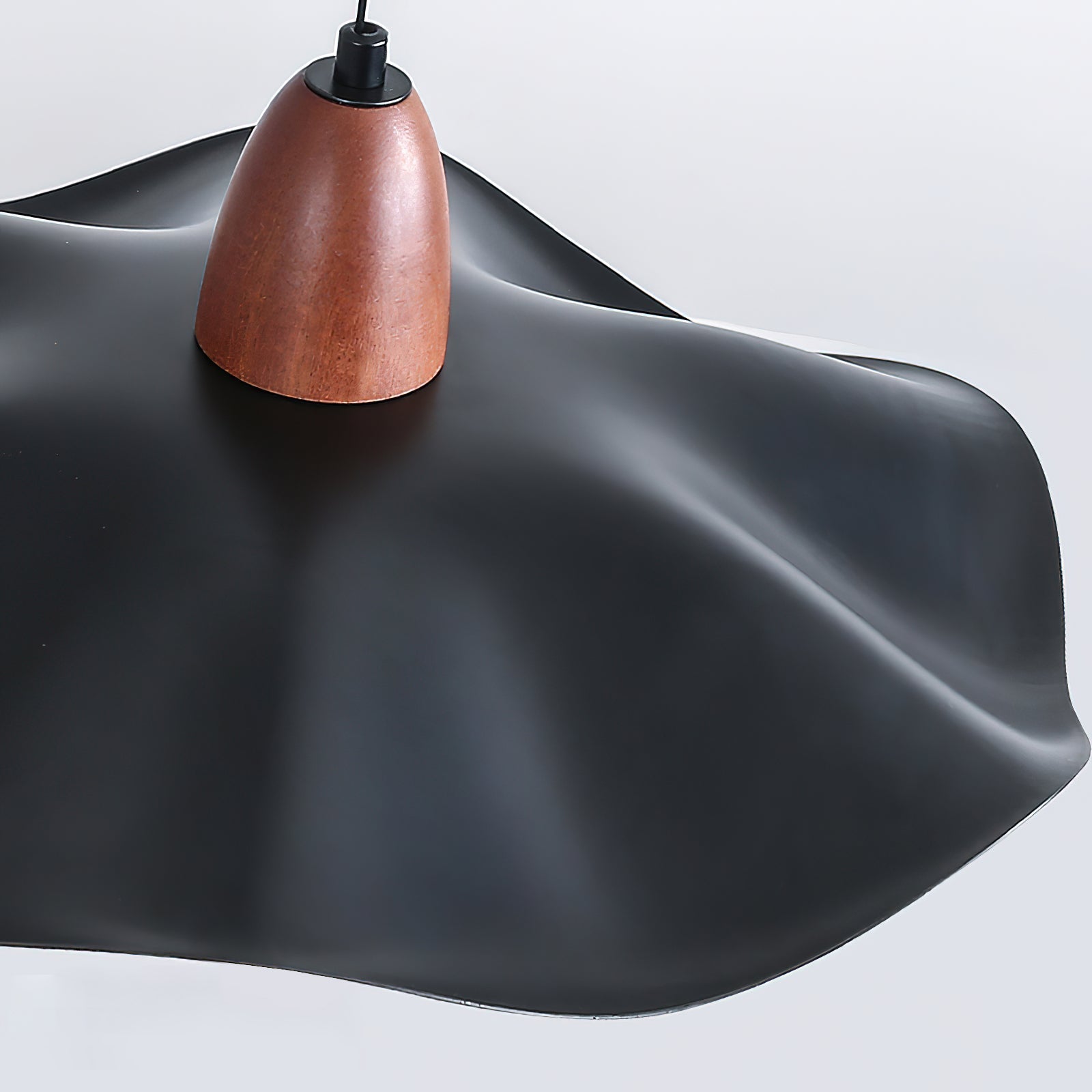 Lifestyle image of the pendant light in a contemporary living area.