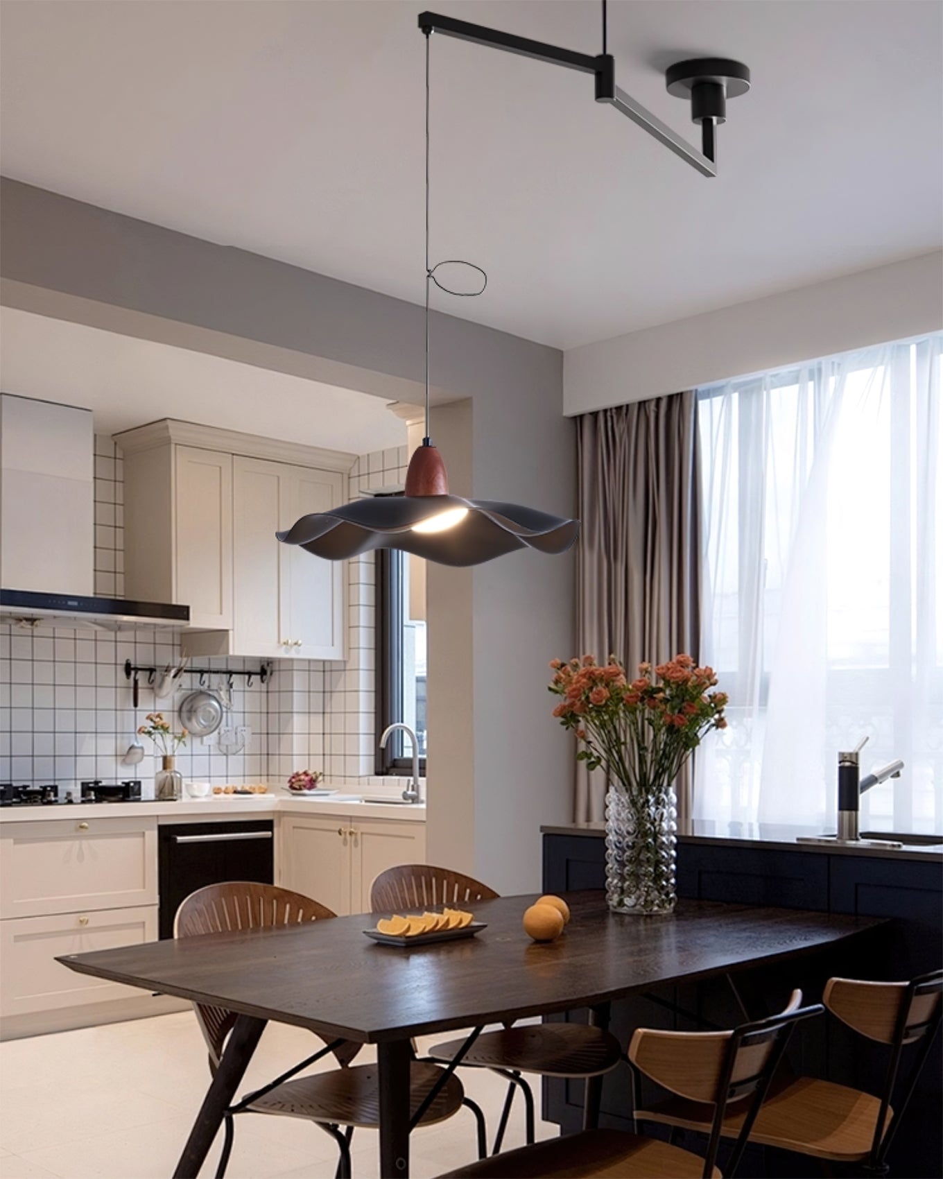 Side profile view of the Tonone swing arm pendant light.